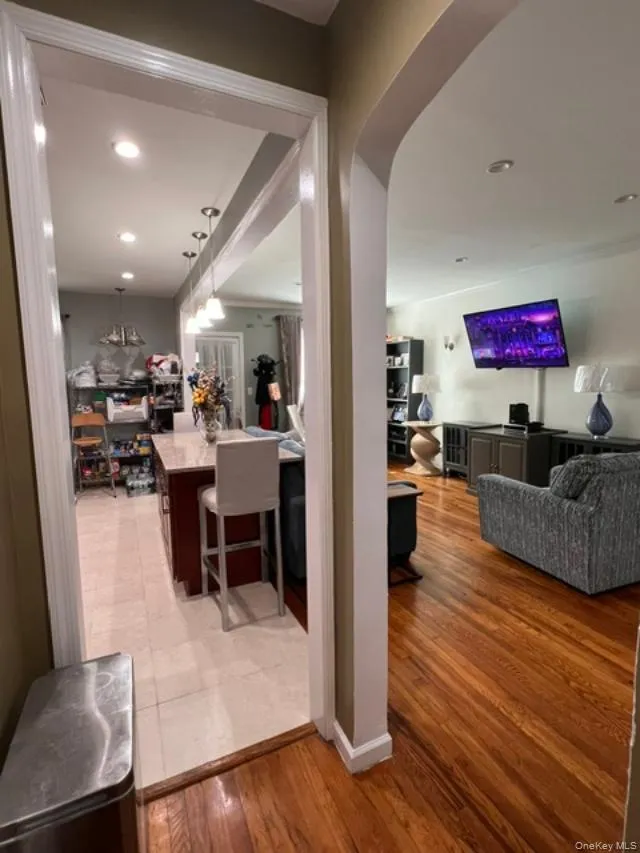 Living Room, Dining Room, Kitchen open floor plan featuring the architectural arched detailing. Living Room, Dining Room, Kitchen open floor plan featuring the architectural arched detailing.