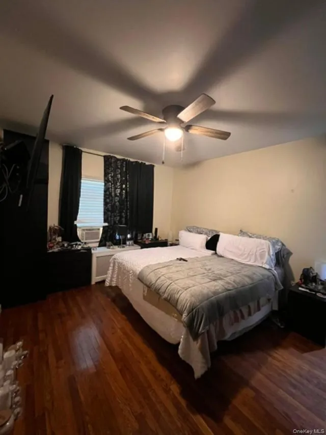 Master Bedroom showcasing Beautiful Hardwood Flooring Master Bedroom showcasing Beautiful Hardwood Flooring
