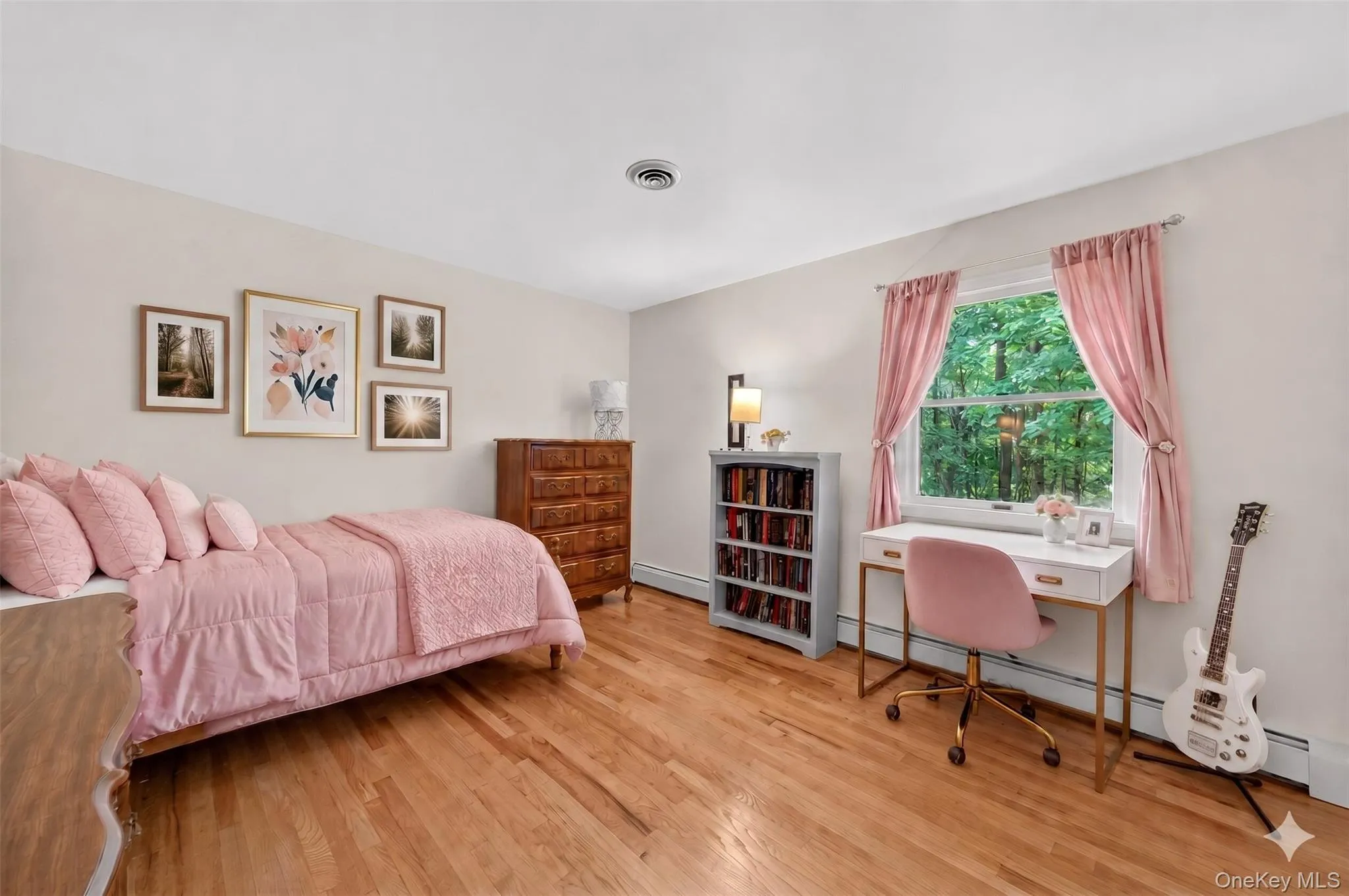 Virtually staged. Cozy secondary bedroom with comfortable proportions and abundant natural light. Virtually staged. Cozy secondary bedroom with comfortable proportions and abundant natural light.