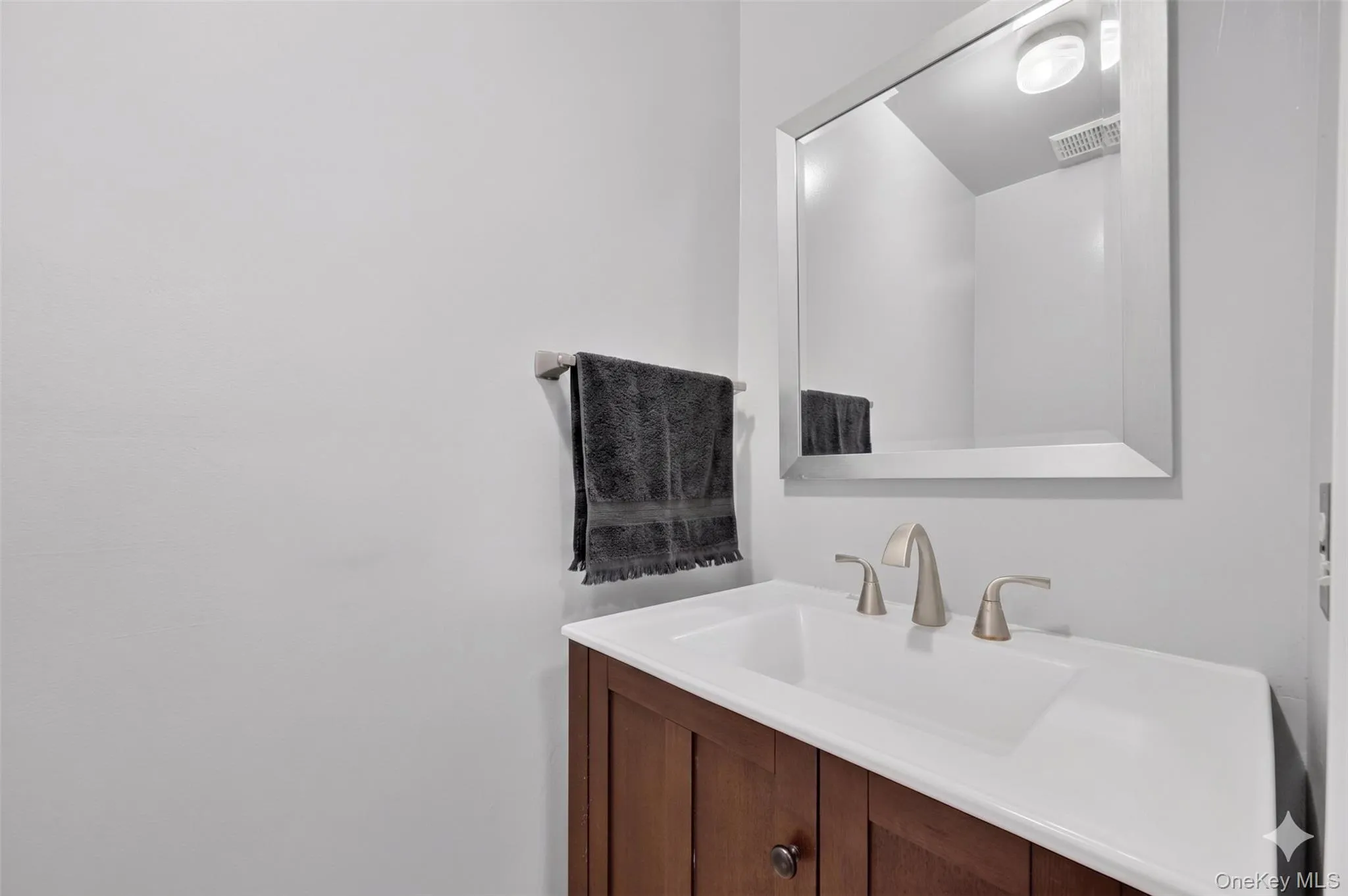 Convenient half bath located for guests and everyday accessibility. Convenient half bath located for guests and everyday accessibility.