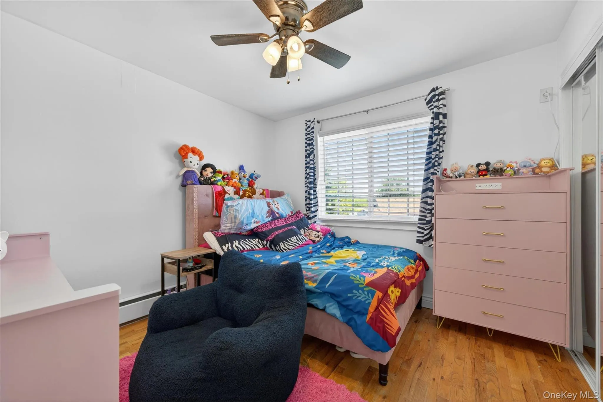 Bedroom 3 - Hardwood Flooring and closet. Bedroom 3 - Hardwood Flooring and closet.