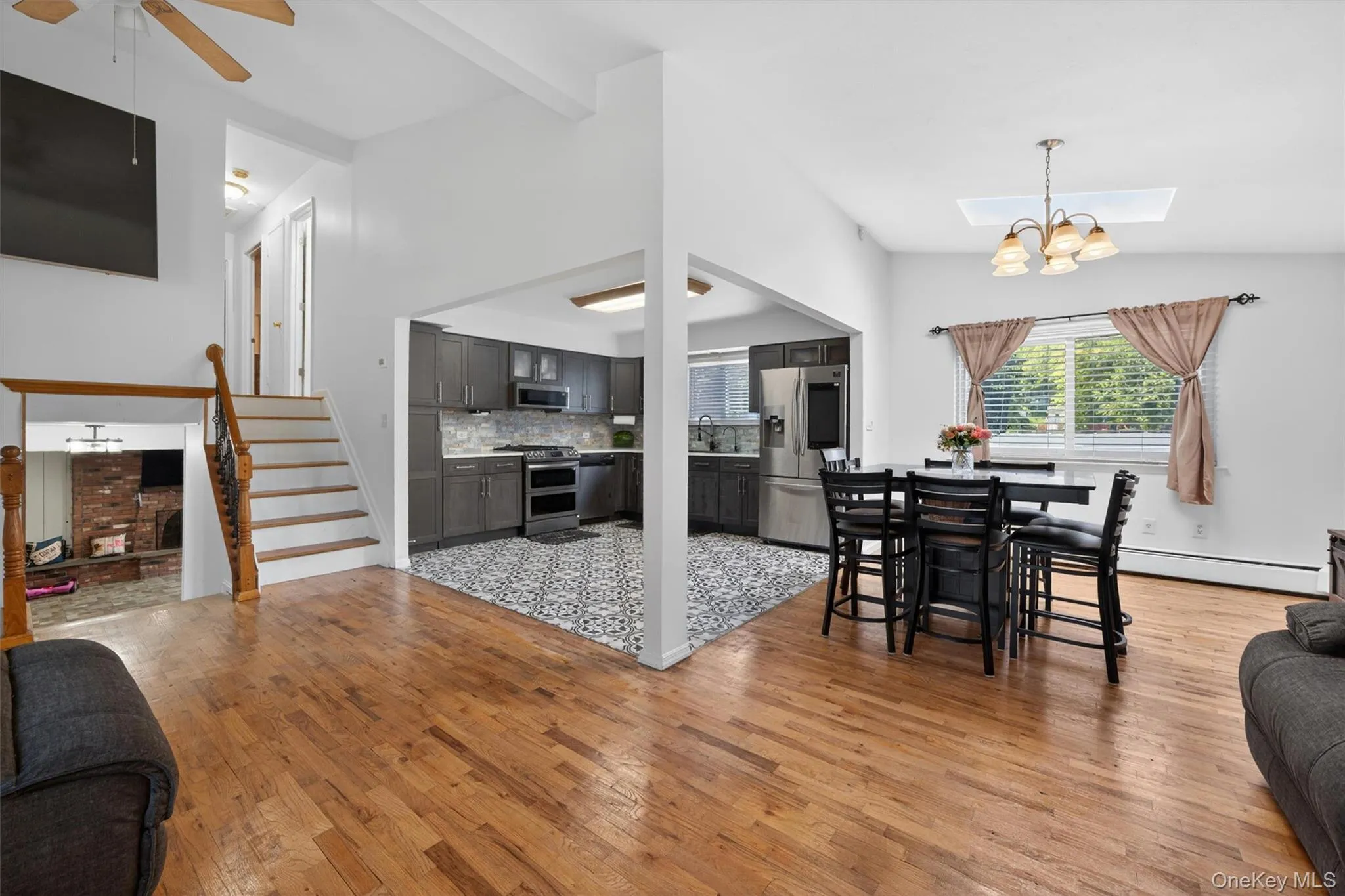 Open floor plan kitchen, dining and living room area. Open floor plan kitchen, dining and living room area.