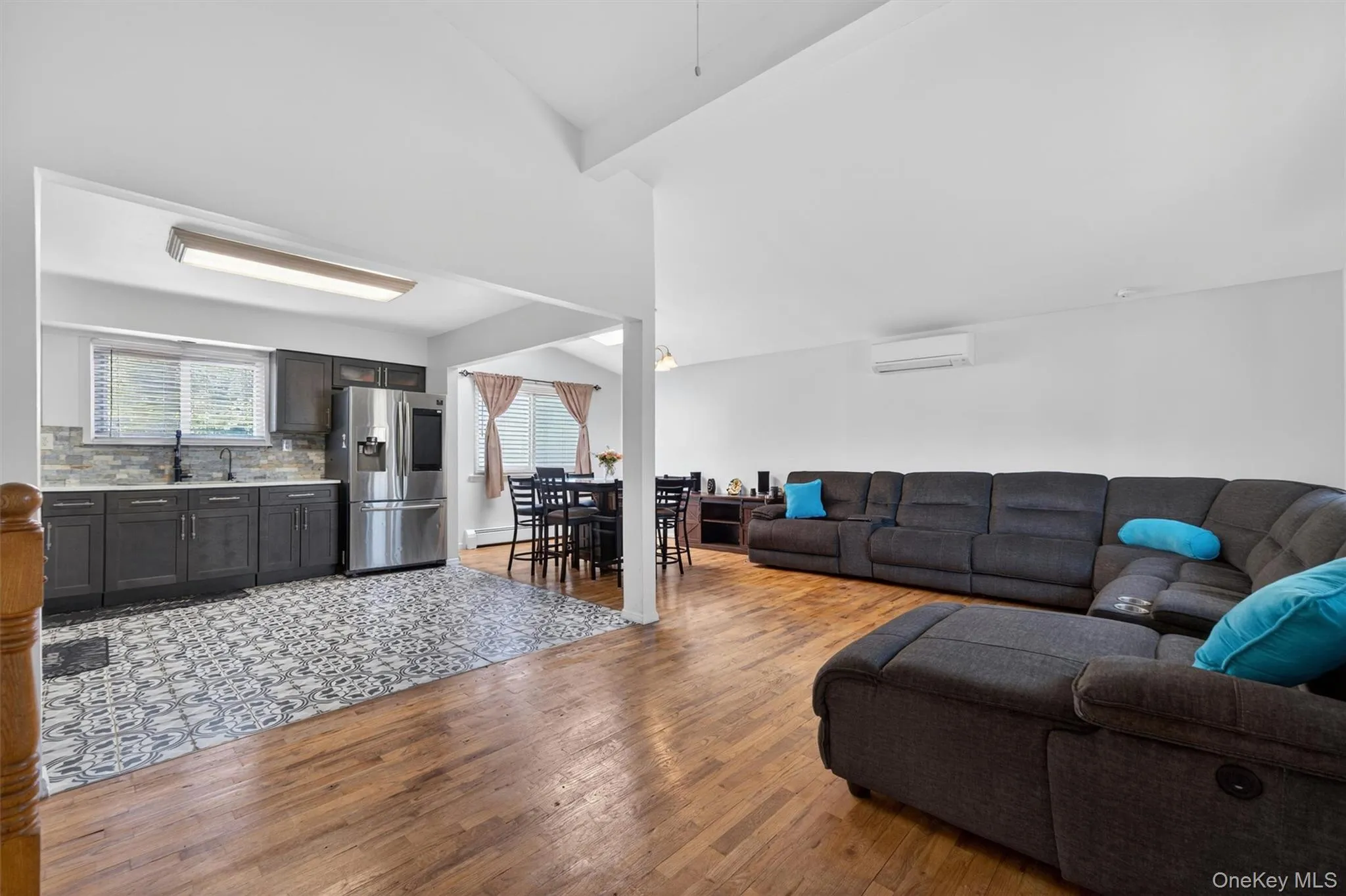 2nd level features kitchen, dining and living room open area. 2nd level features kitchen, dining and living room open area.