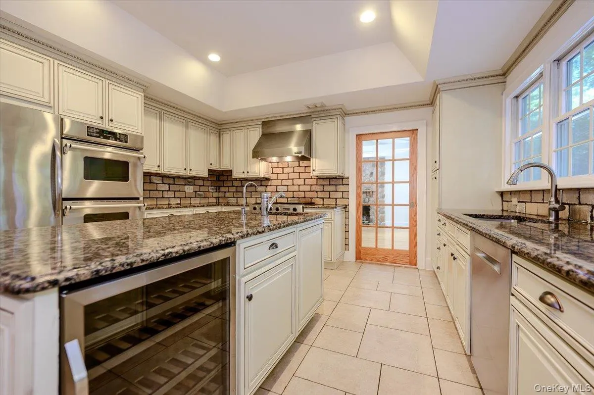 Stainless steel Jenn Air appliances, Amana refrigerator, Edge Star beverage refrigerator and Bosch dishwasher Stainless steel Jenn Air appliances, Amana refrigerator, Edge Star beverage refrigerator and Bosch dishwasher