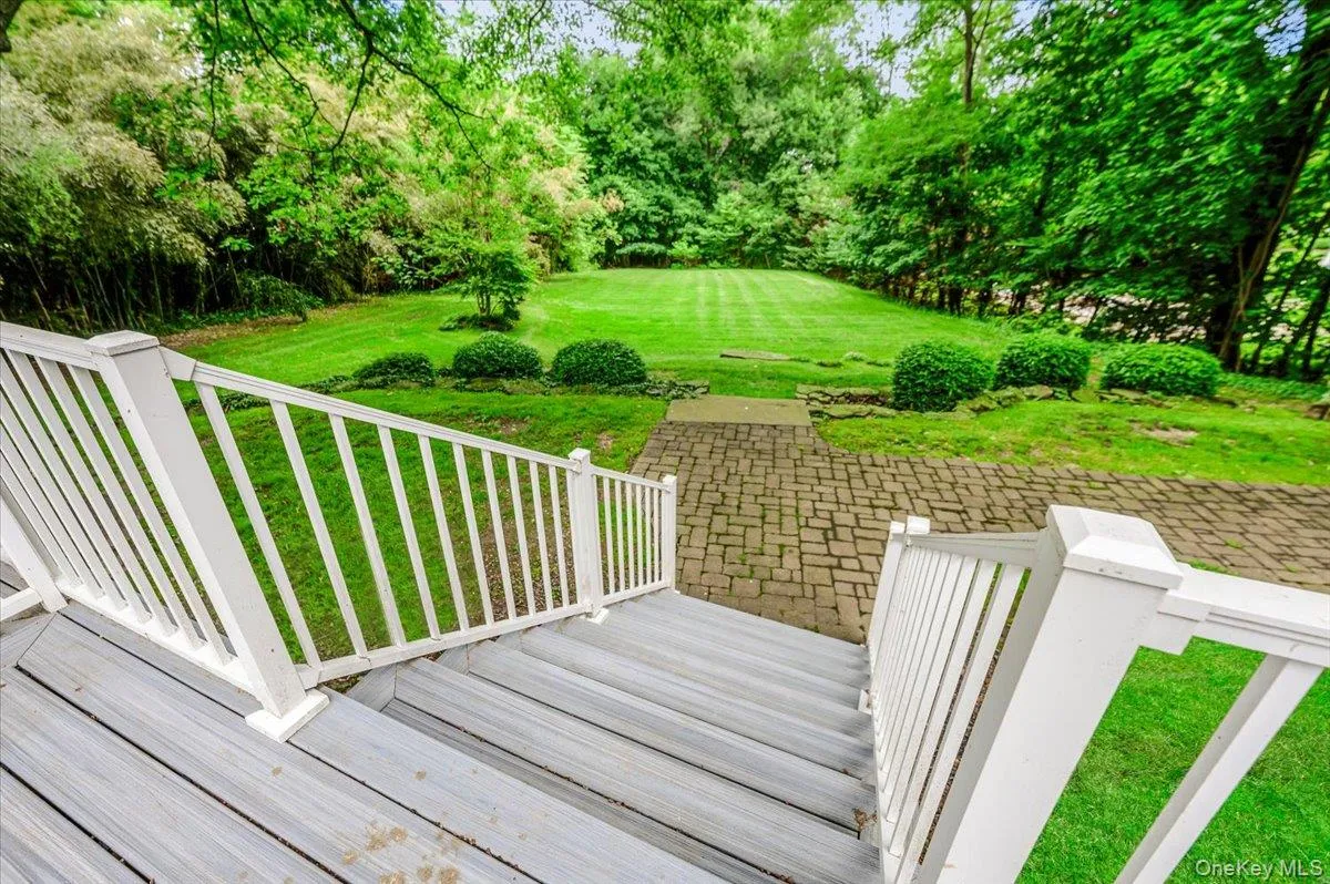 Steps to patio area, walk ways, stacked stone walls and yard Steps to patio area, walk ways, stacked stone walls and yard