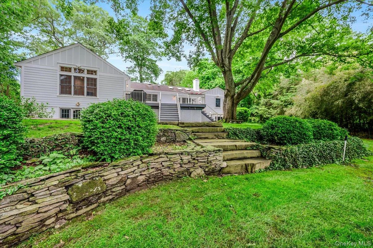 Thoughtfully designed stone walls and steps highlight the property Thoughtfully designed stone walls and steps highlight the property