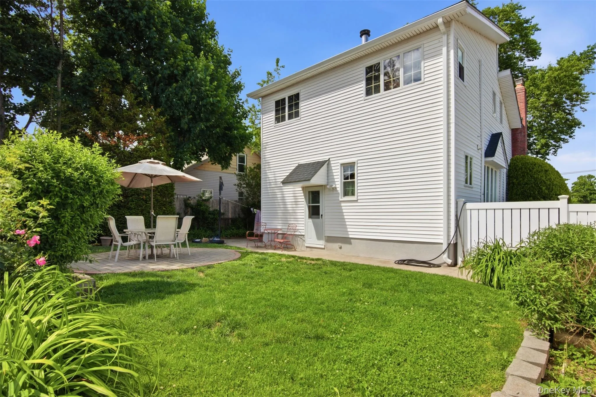 Beautifully manicured lawn as you step out of the back door. Beautifully manicured lawn as you step out of the back door.