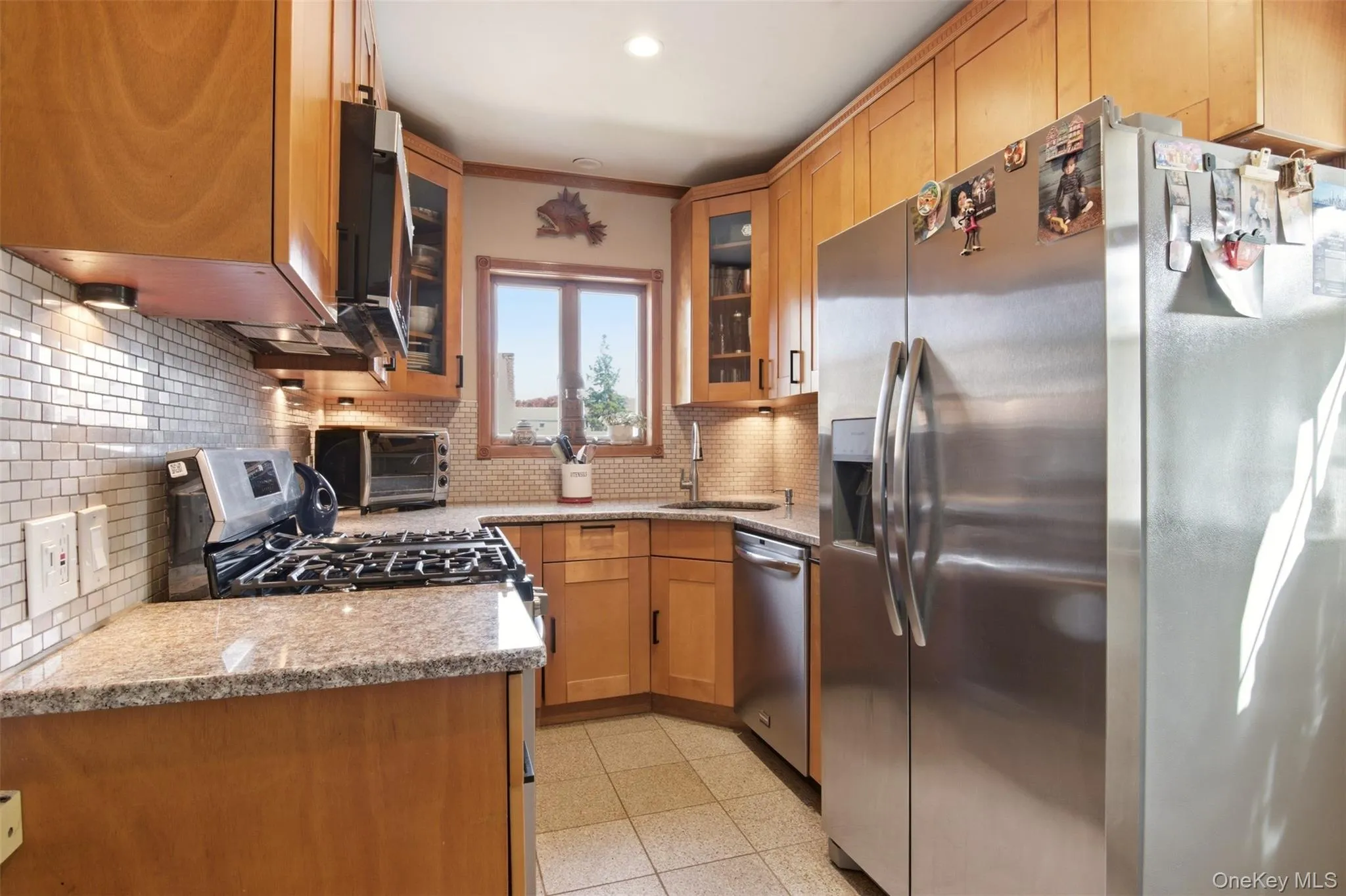 New updated kitchen with Stainless steel appliances including dishwasher and hi hat ceiling lights. New updated kitchen with Stainless steel appliances including dishwasher and hi hat ceiling lights.
