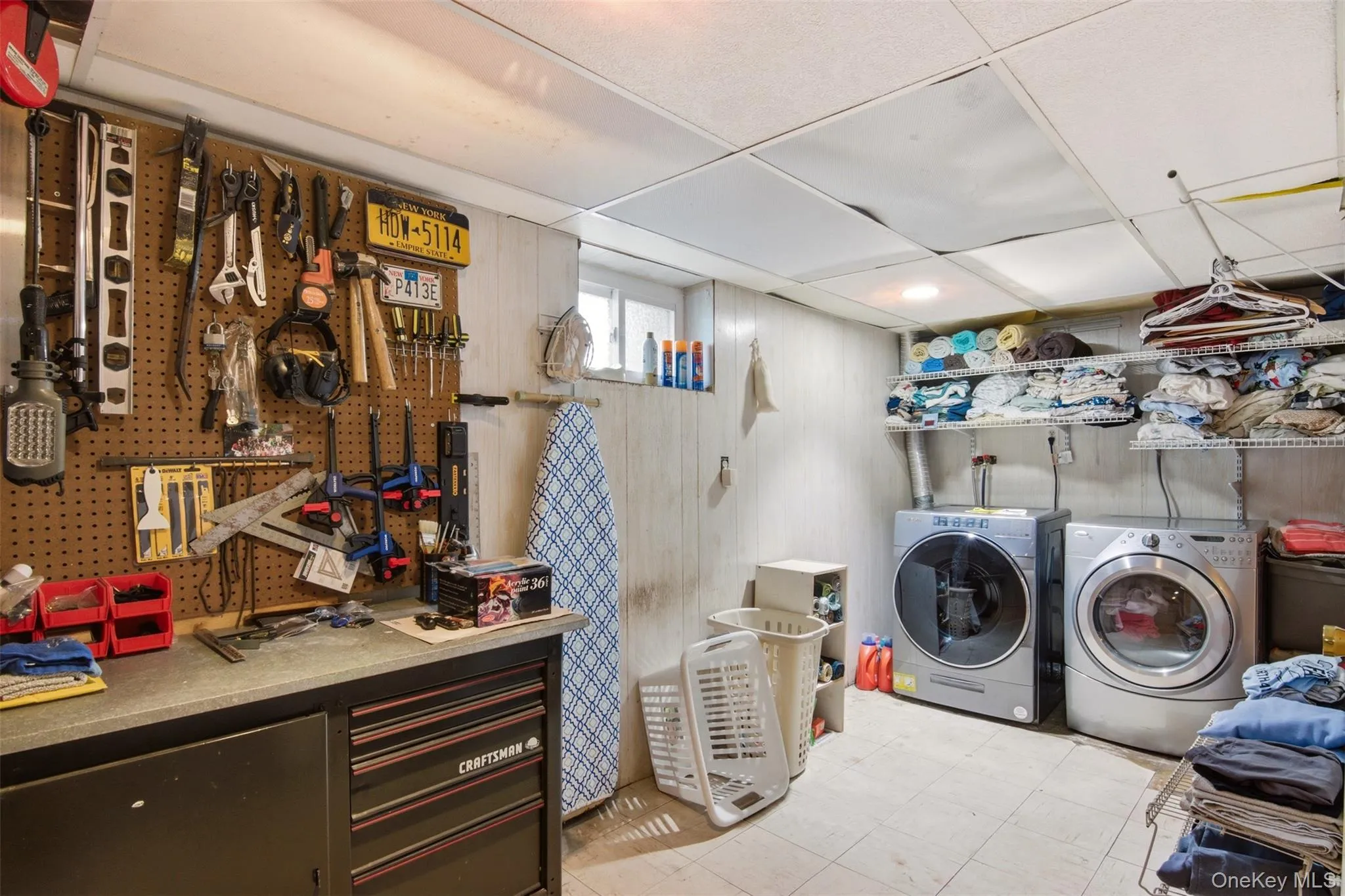 Laundry room and work room area. Laundry room and work room area.