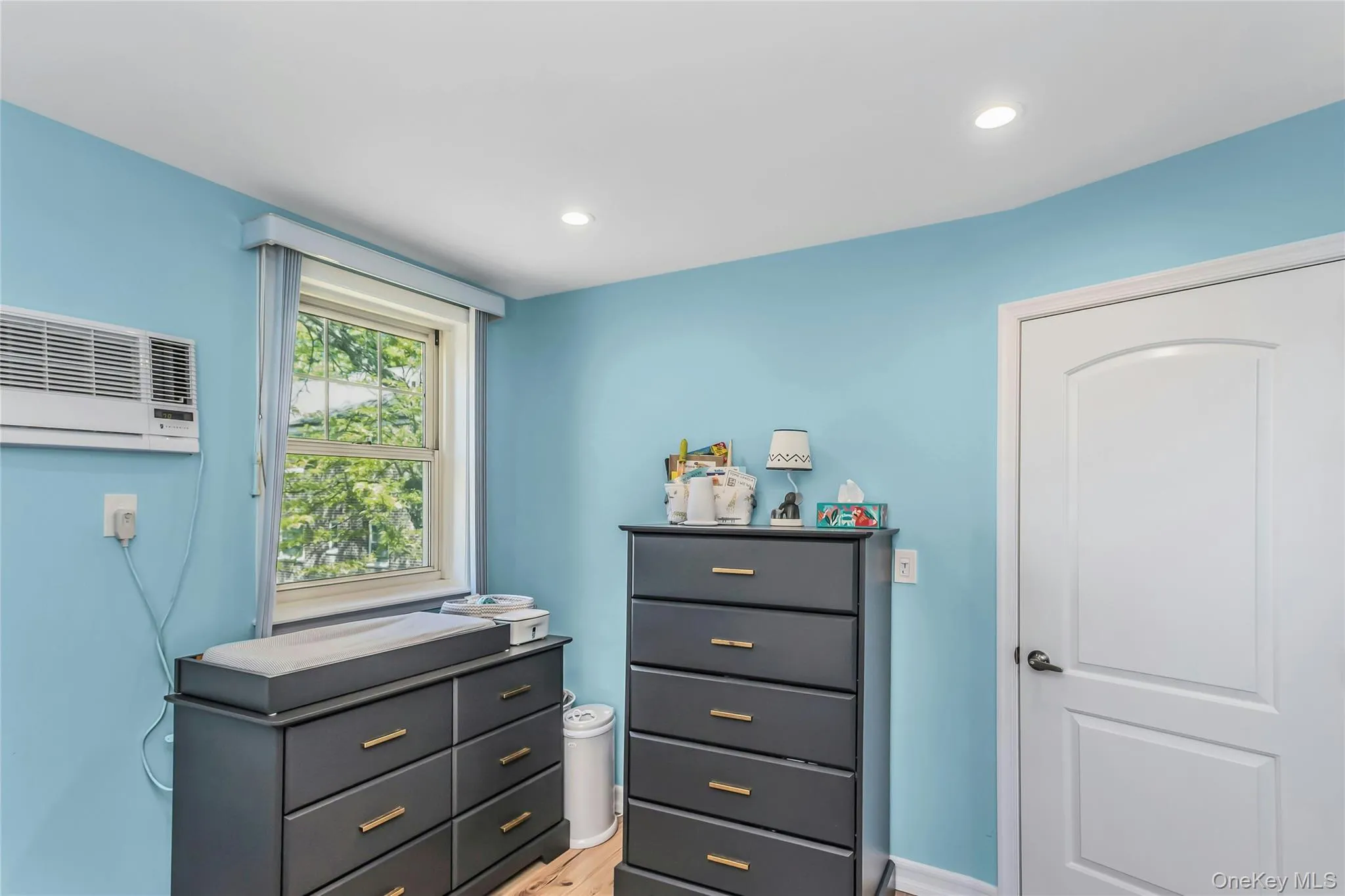 Second bedroom with plenty of natural light and recessed ceiling lighting Second bedroom with plenty of natural light and recessed ceiling lighting