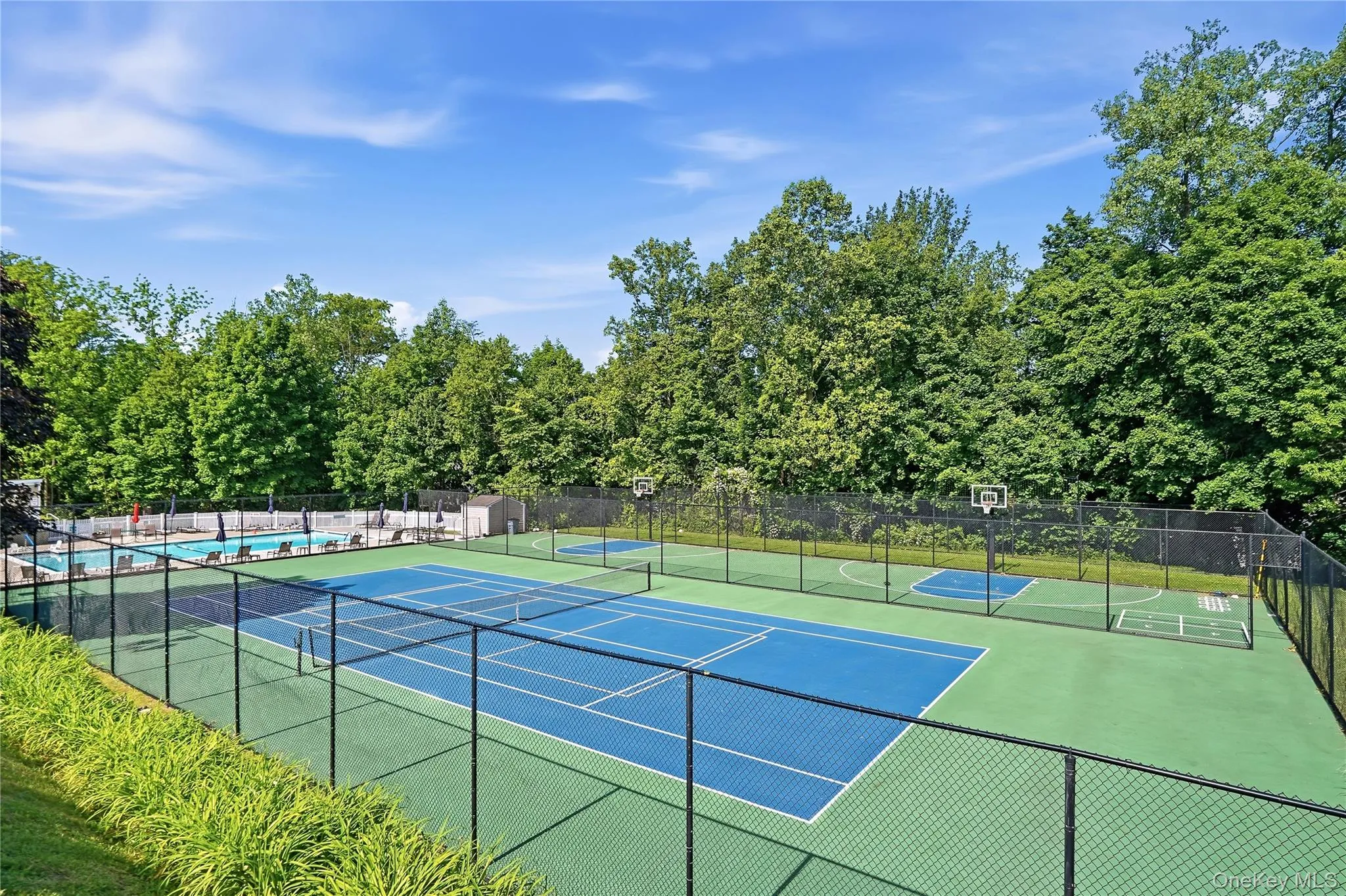 Community tennis court and basketball court Community tennis court and basketball court