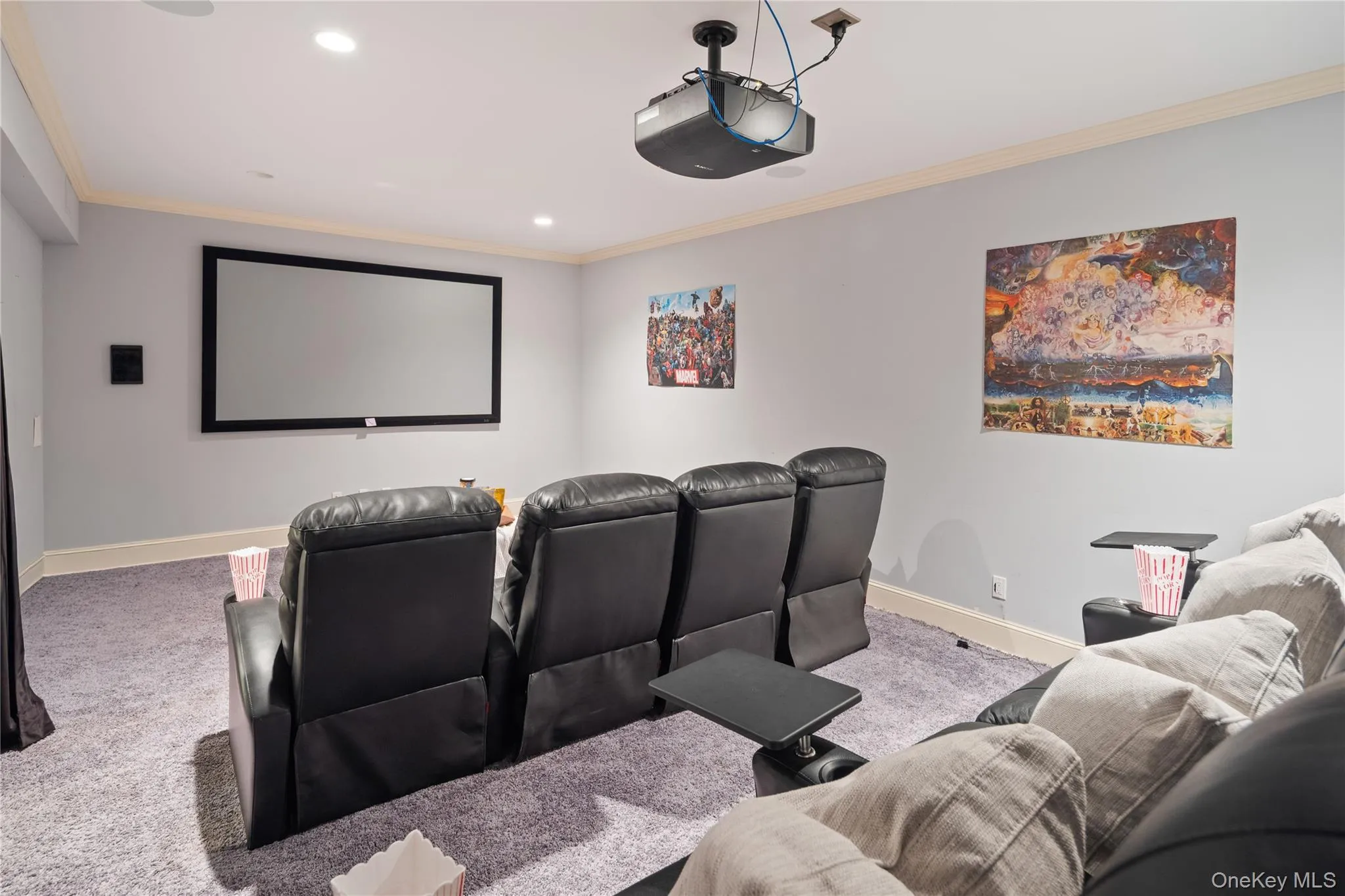 Dedicated media room with projector video and stadium seating included Dedicated media room with projector video and stadium seating included