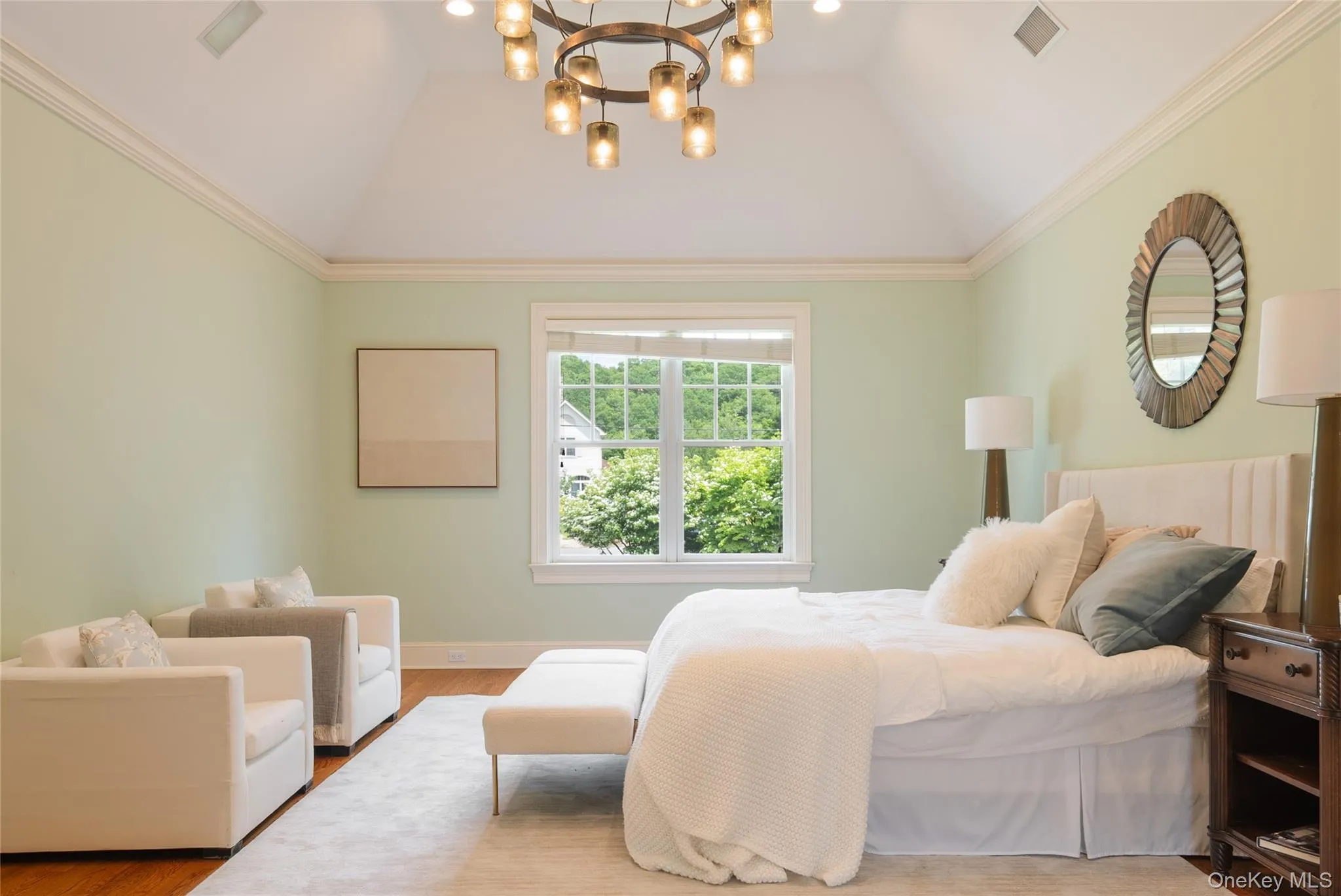 Second floor primary King size bedroom with tray ceiling, dressing area, dual walk-in closets, en-suite spa style bath, adjacent sitting room/home office Second floor primary King size bedroom with tray ceiling, dressing area, dual walk-in closets, en-suite spa style bath, adjacent sitting room/home office