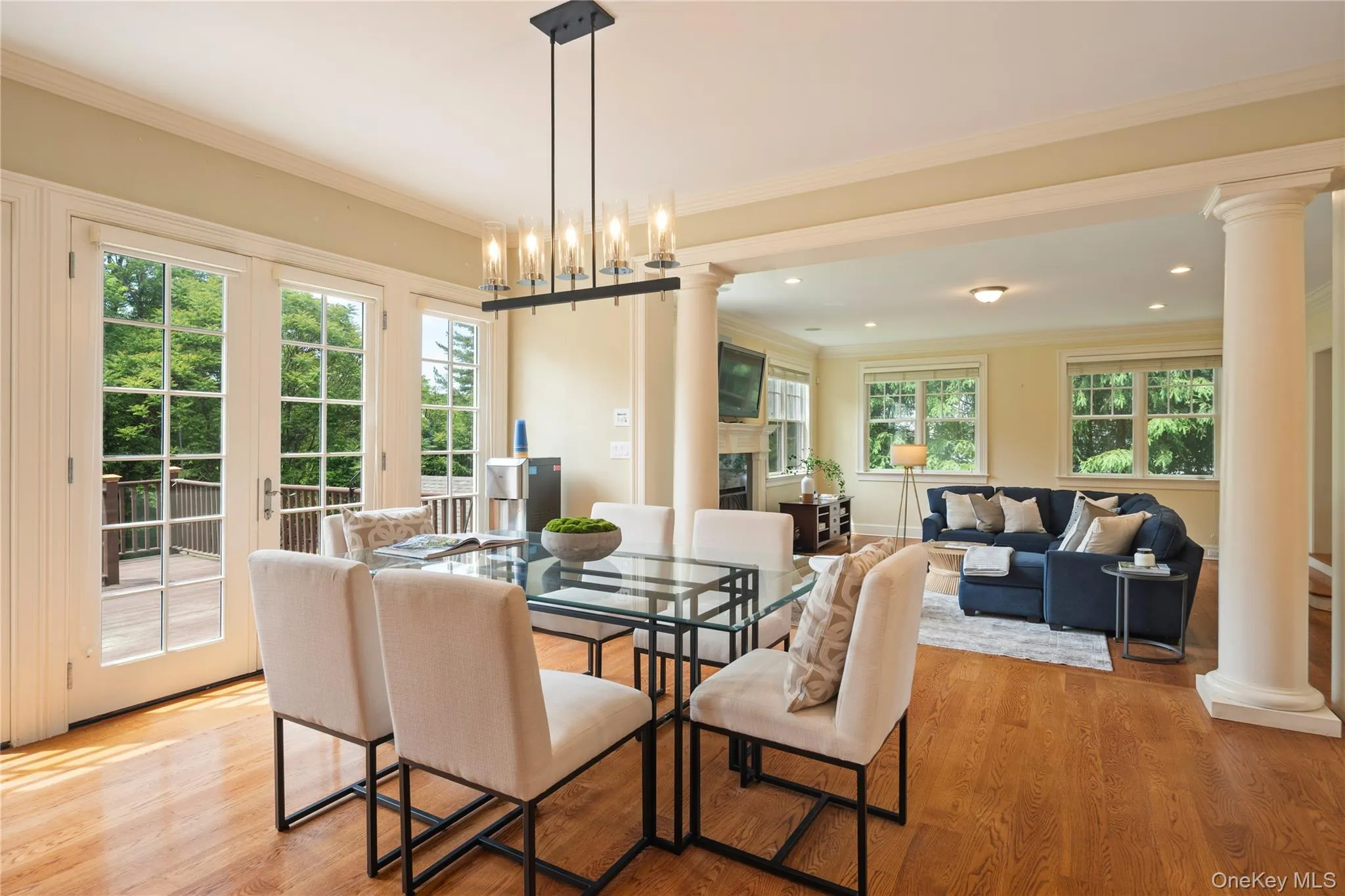 Breakfast area in eat-in kitchen with French doors to expansive deck Breakfast area in eat-in kitchen with French doors to expansive deck