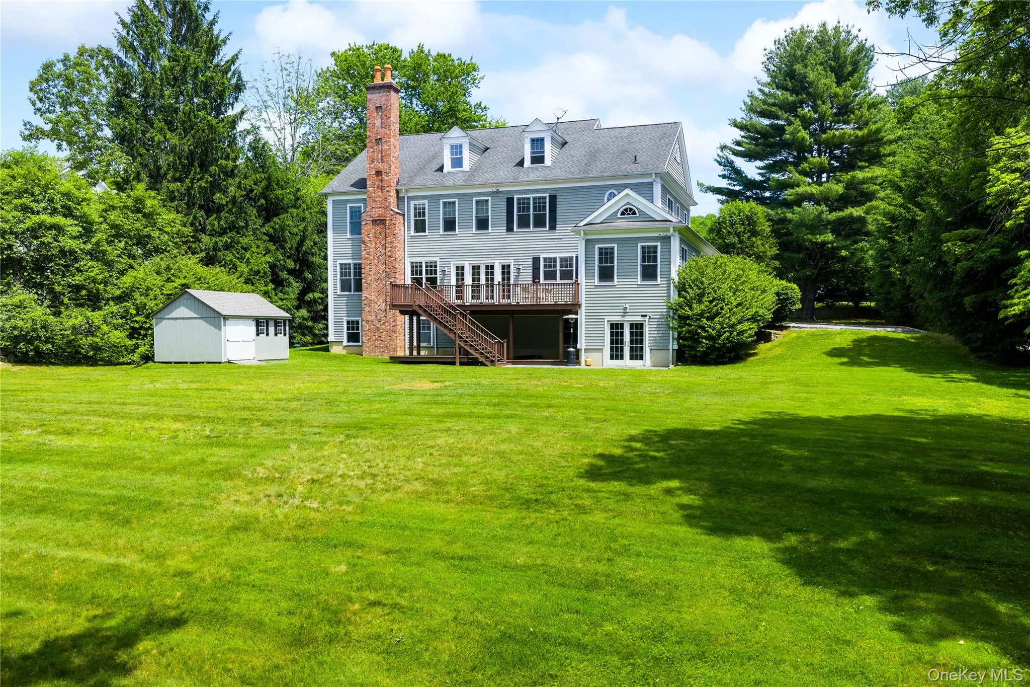 A flat, expansive backyard offers ample play space A flat, expansive backyard offers ample play space
