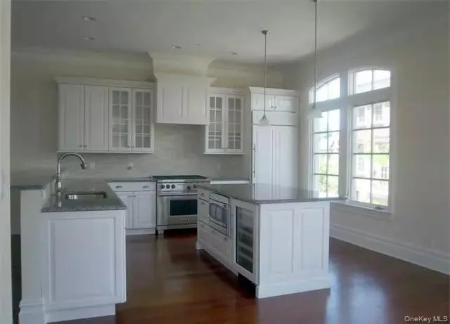 Gourmet eat in kitchen... plenty of cabinetry... high end SS appliances... microwave & beverage center built into center island... large built in French door fridge... Gourmet eat in kitchen... plenty of cabinetry... high end SS appliances... microwave & beverage center built into center island... large built in French door fridge...
