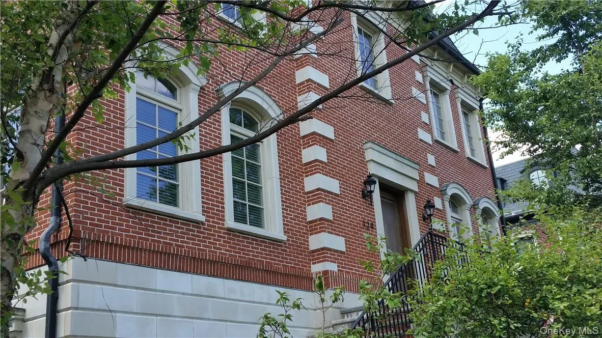 Stately main entry... framed by wrought iron railing... beautiful architectural exterior detailing throughout... Stately main entry... framed by wrought iron railing... beautiful architectural exterior detailing throughout...