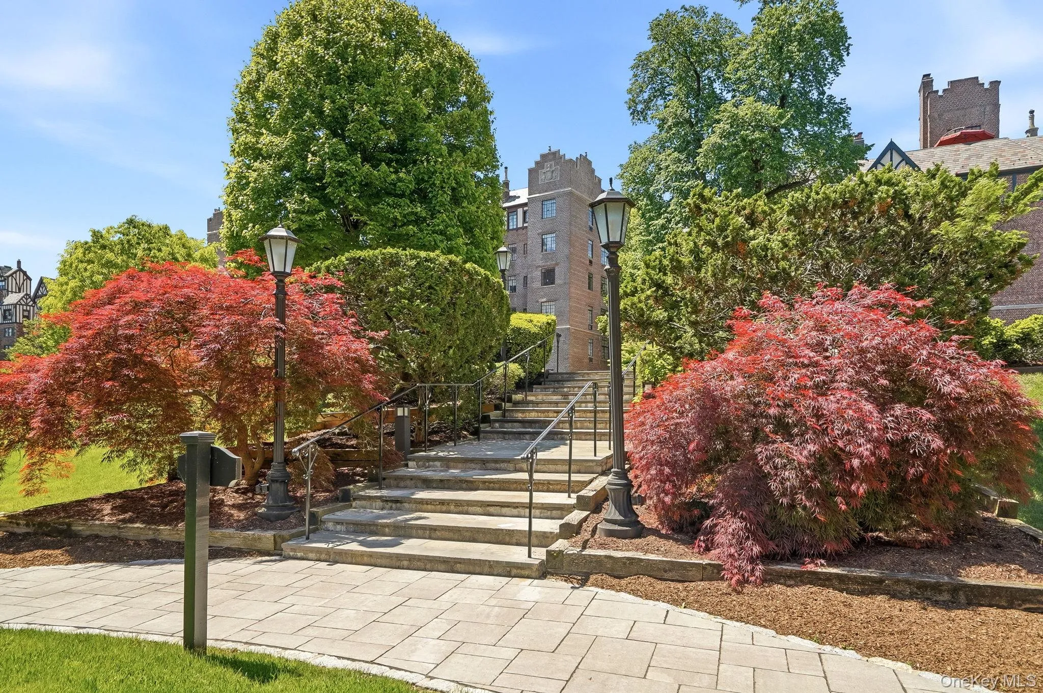 Grand and beautifully landscaped entrance welcoming you into this meticulously maintained building. Grand and beautifully landscaped entrance welcoming you into this meticulously maintained building.