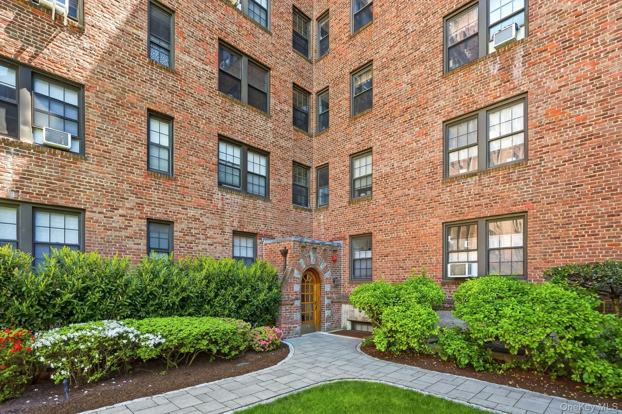 Beautifully maintained building entrance leading to Unit 6G. Beautifully maintained building entrance leading to Unit 6G.