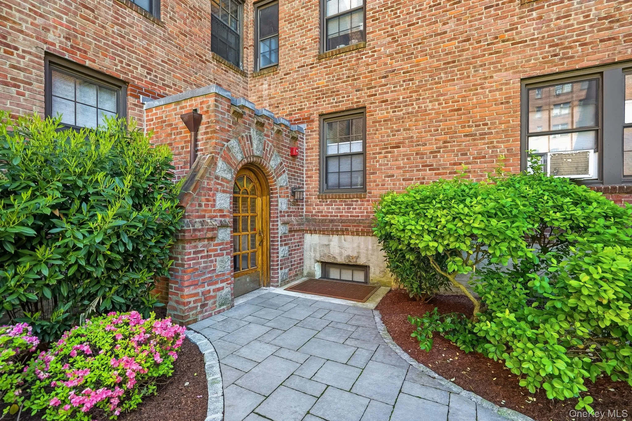 Beautifully maintained building entrance leading to Unit 6G. Beautifully maintained building entrance leading to Unit 6G.