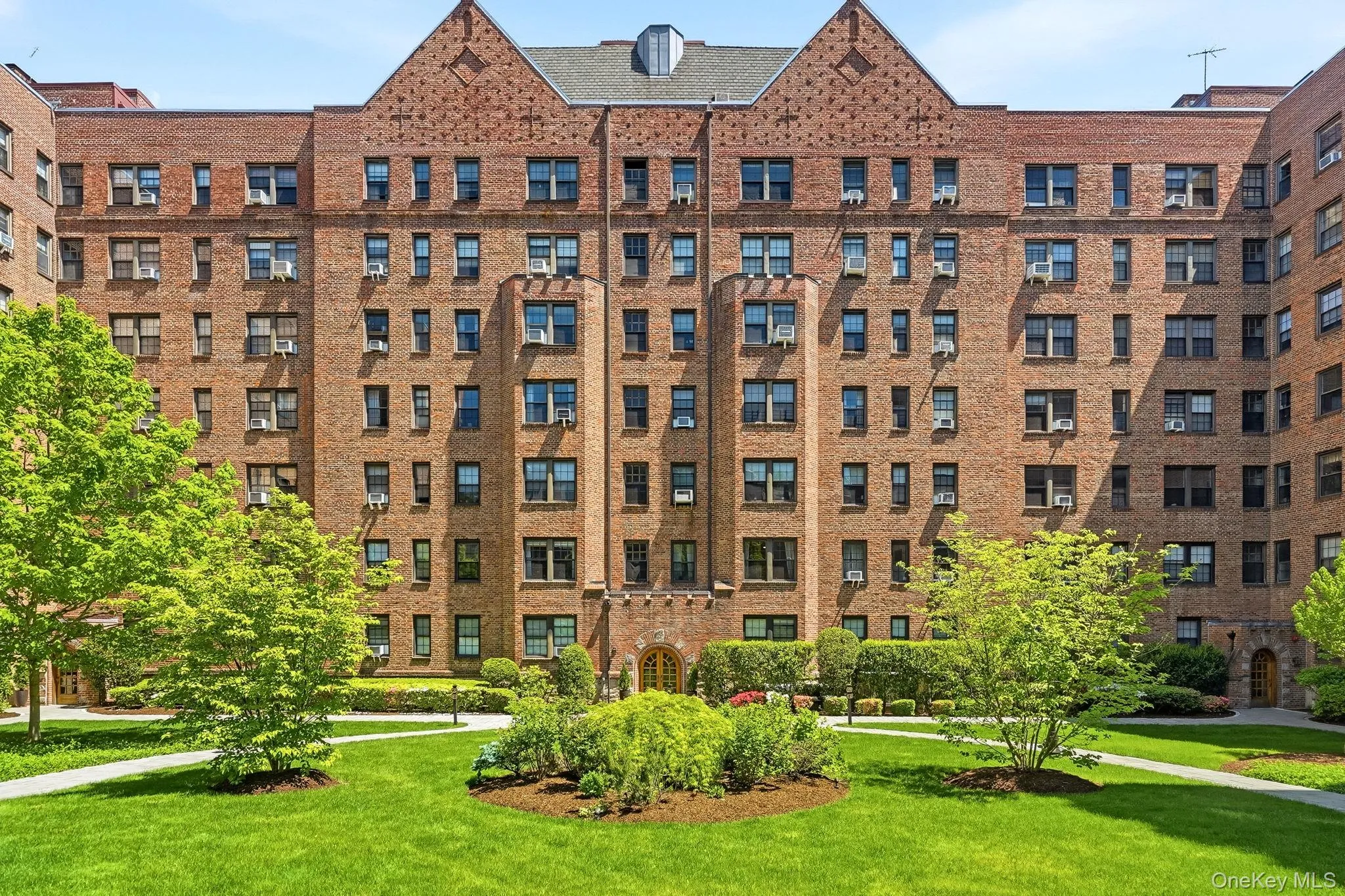 Stunning courtyard views surrounded by lush greenery and classic architecture. Stunning courtyard views surrounded by lush greenery and classic architecture.