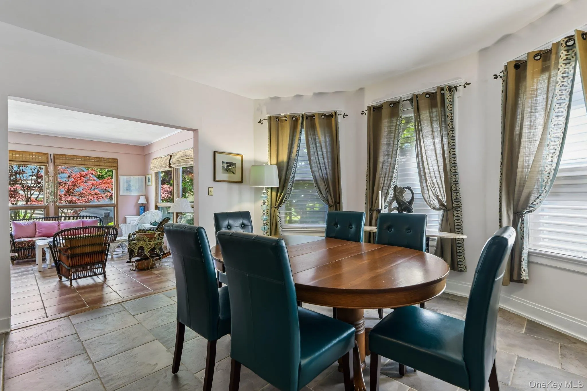 Large Dining Room w/Views of Sunroom Large Dining Room w/Views of Sunroom