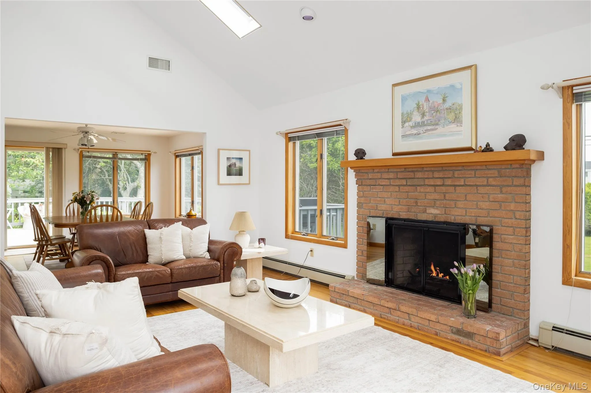 Living Room w/ Wood Burning Fireplace Living Room w/ Wood Burning Fireplace