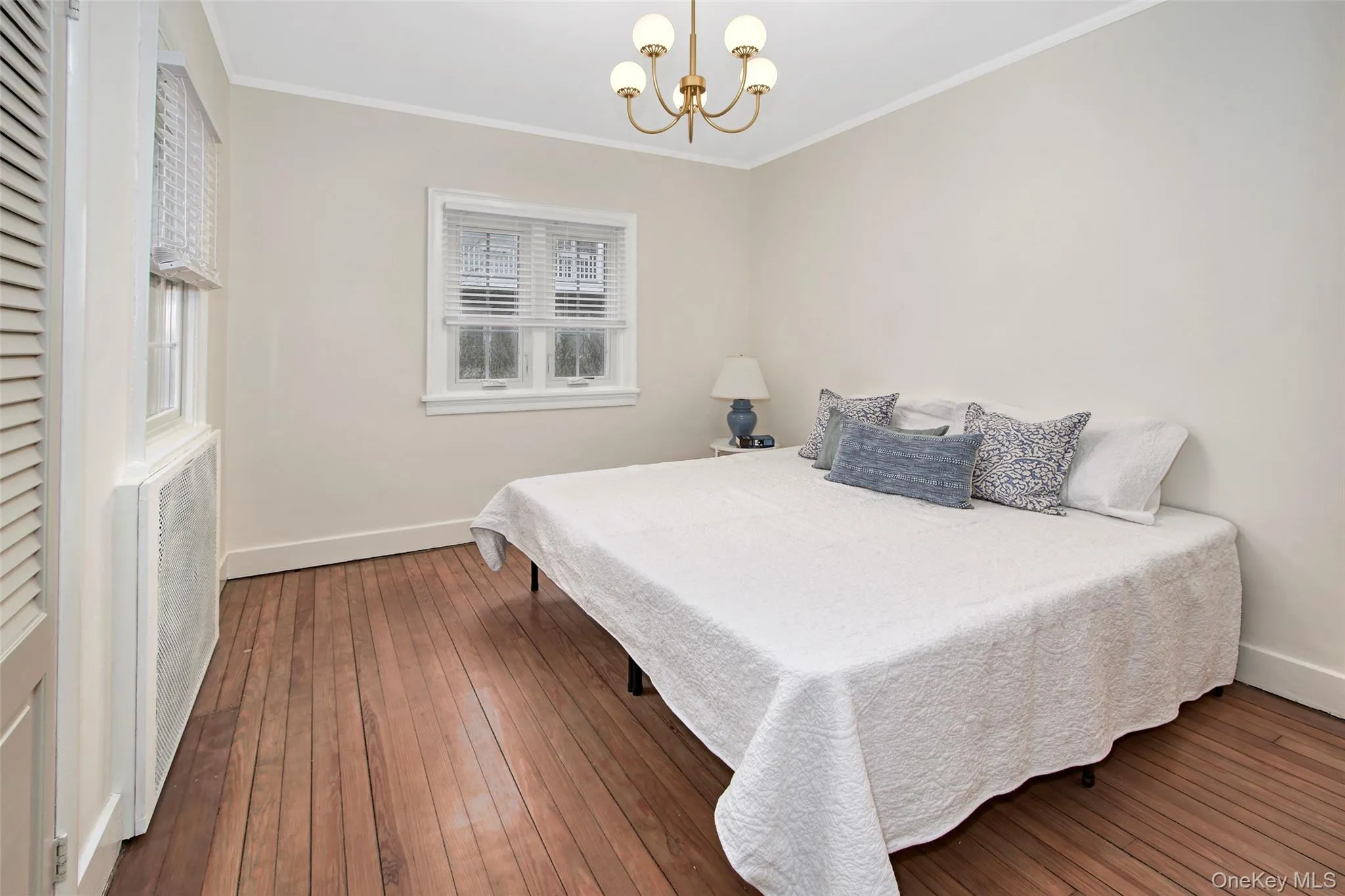 Hardwood flooring, painted walls, and white trim Hardwood flooring, painted walls, and white trim