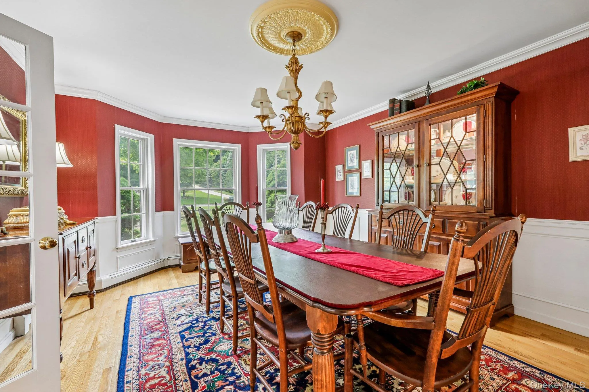 Formal dining room with hardwood floors. Formal dining room with hardwood floors.
