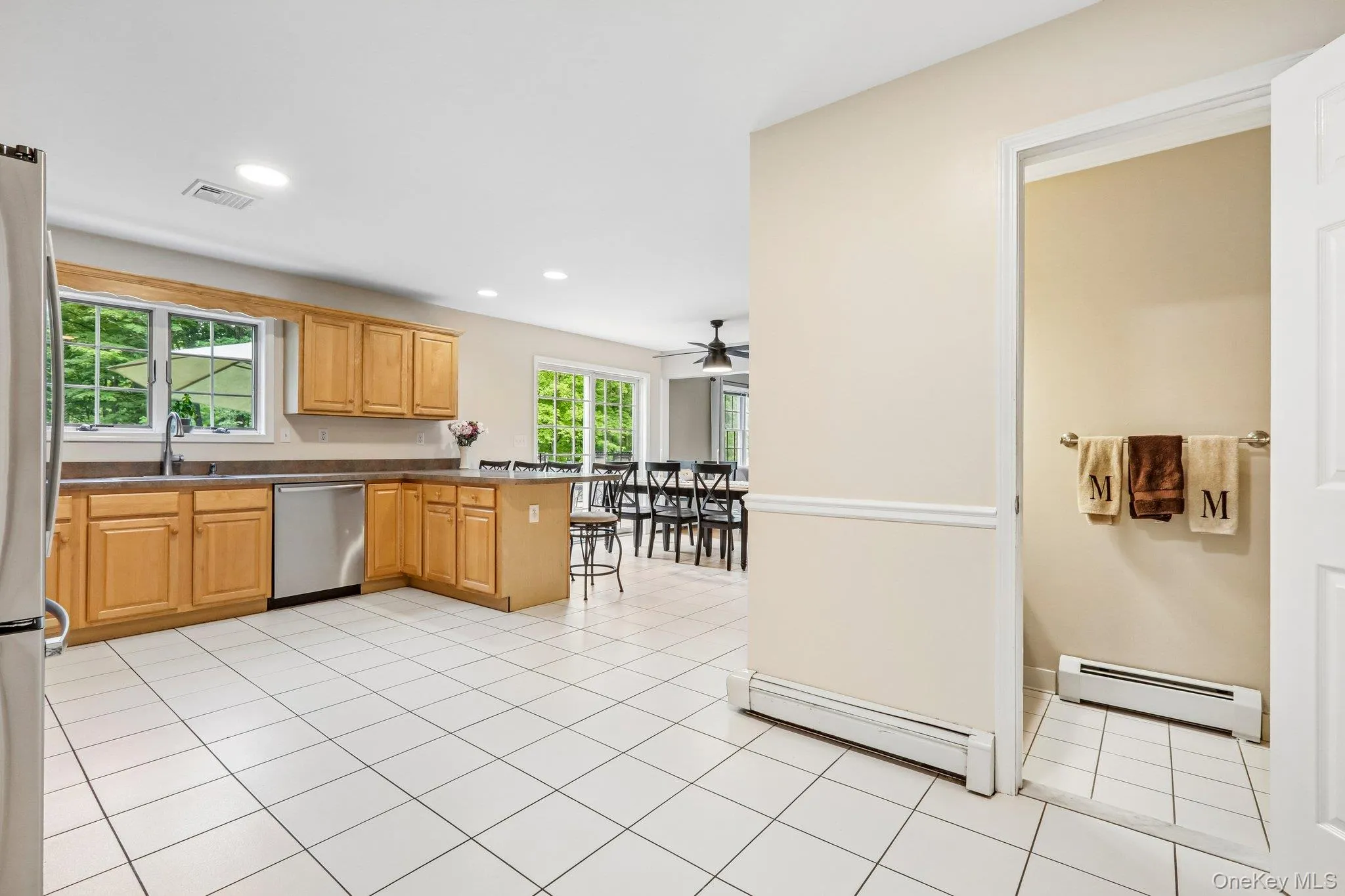 Large kitchen offering stainless steel appliances. Large kitchen offering stainless steel appliances.