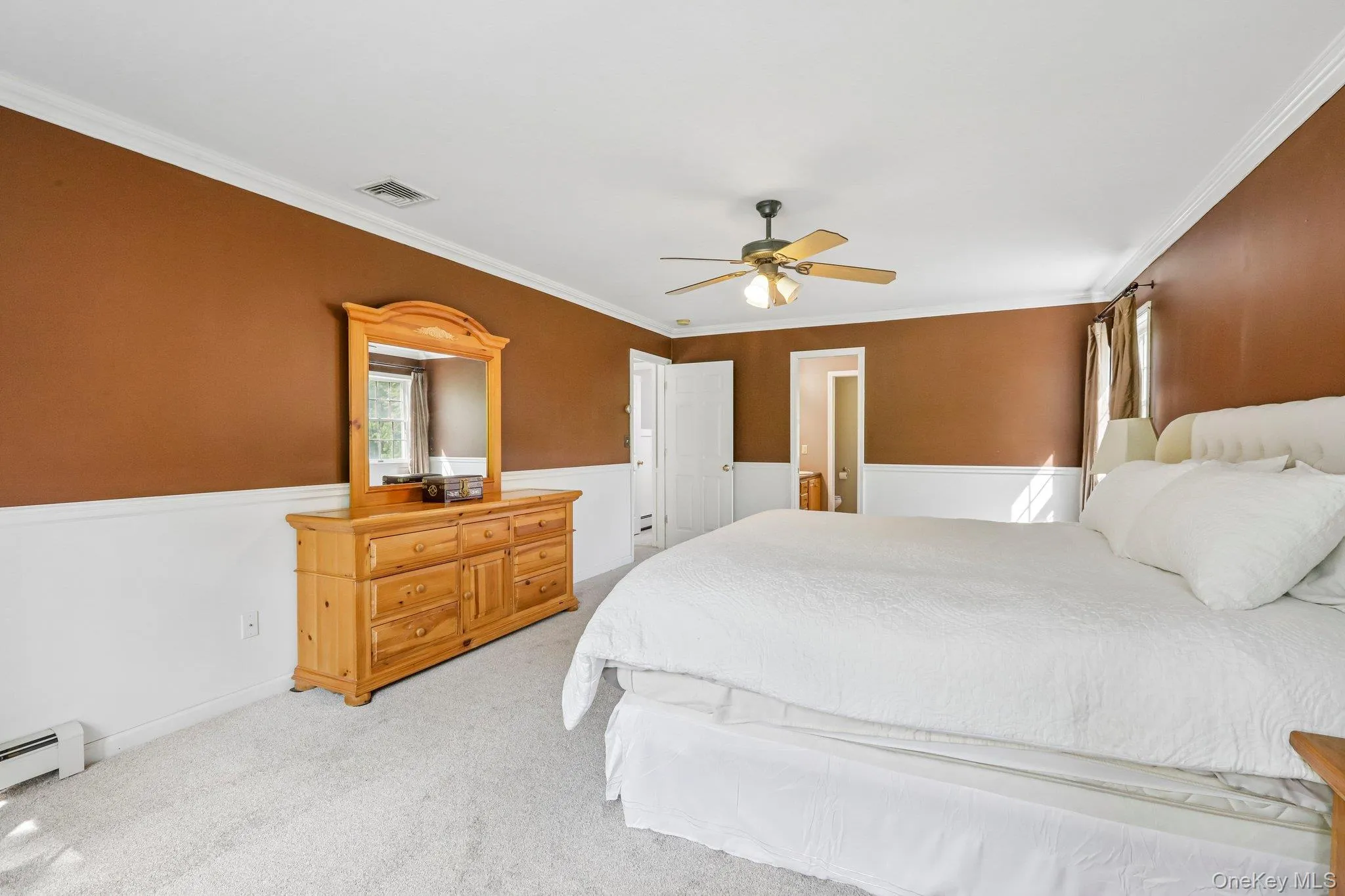 Primary bedroom serves as a private retreat. Primary bedroom serves as a private retreat.