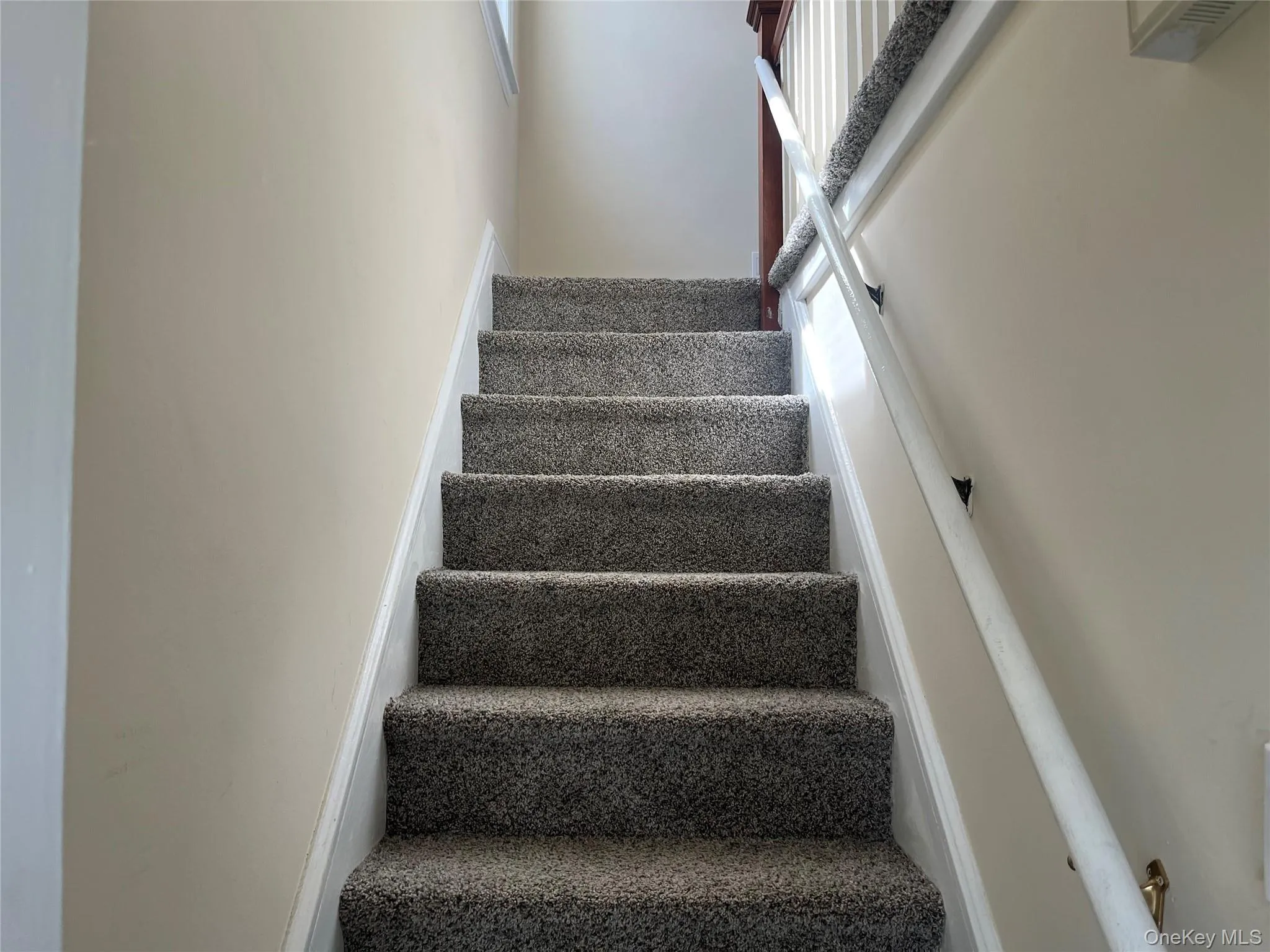 Stairs up to second floor apartment Stairs up to second floor apartment