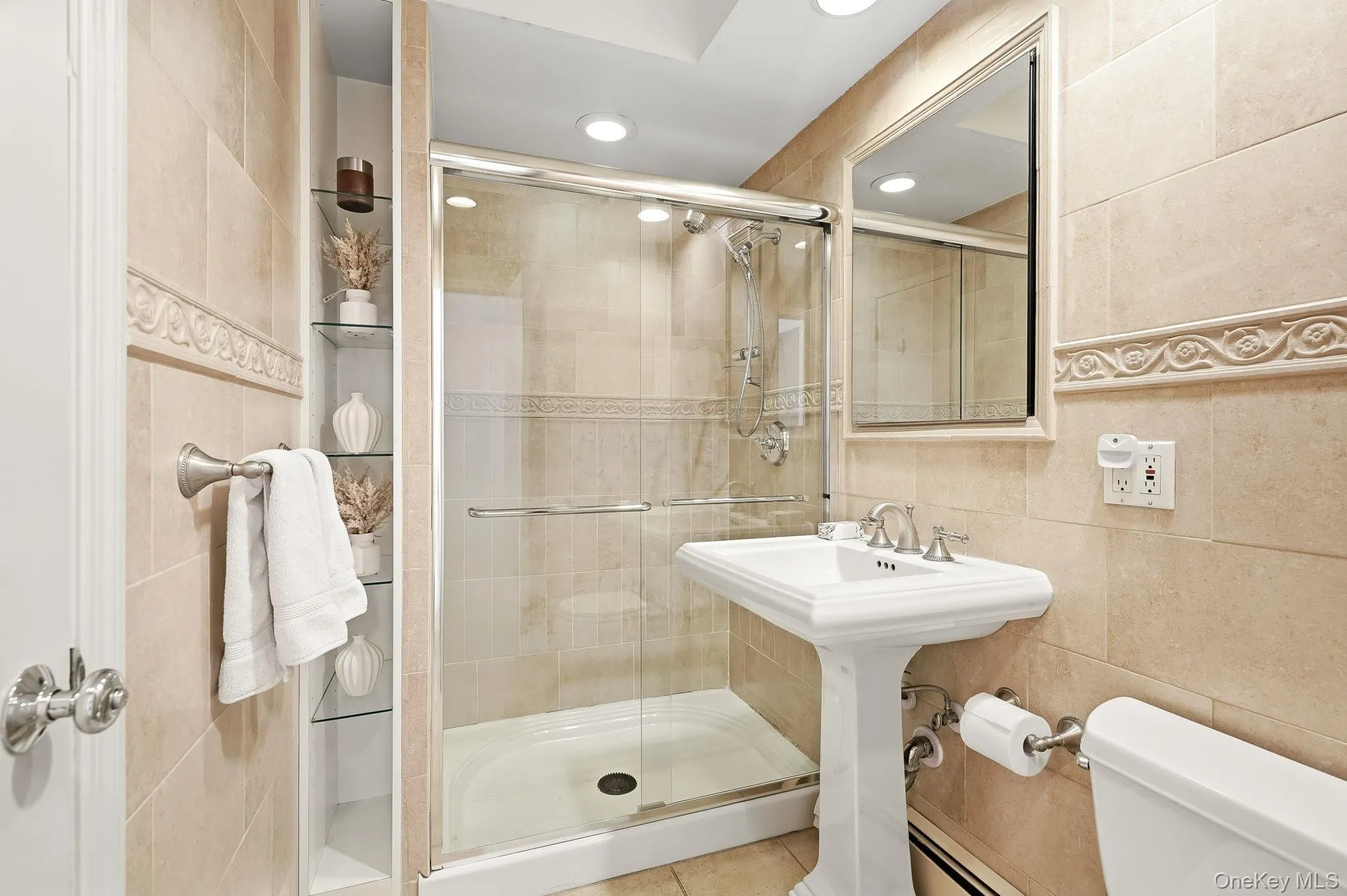First floor full bath with en suite to bedroom First floor full bath with en suite to bedroom