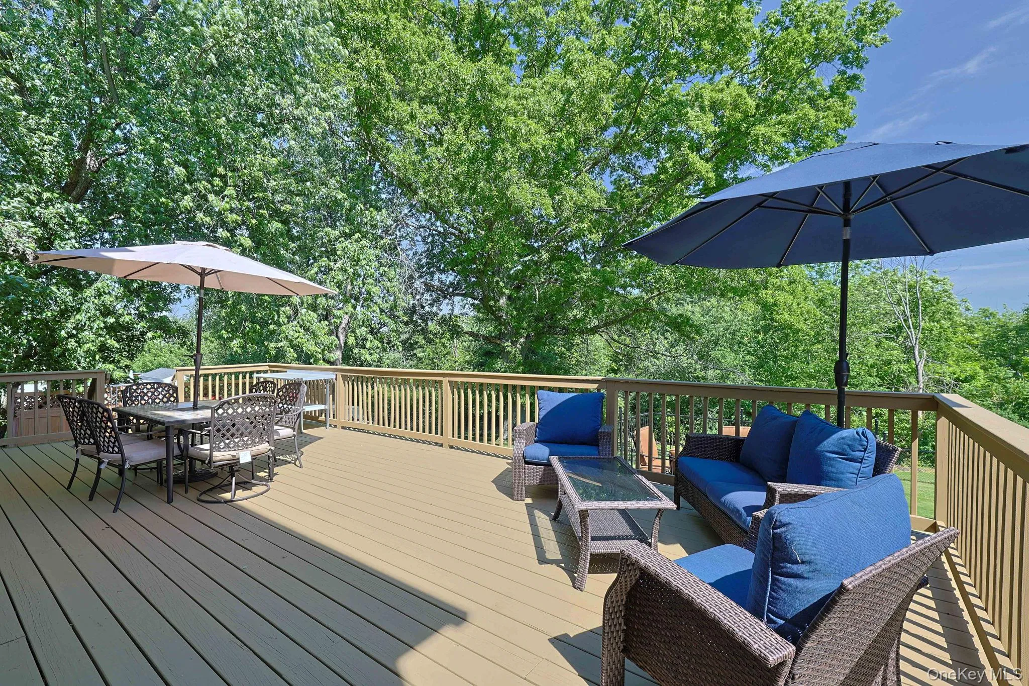 Inviting outdoor deck for grilling that overlooks the yard and above ground pool. Inviting outdoor deck for grilling that overlooks the yard and above ground pool.