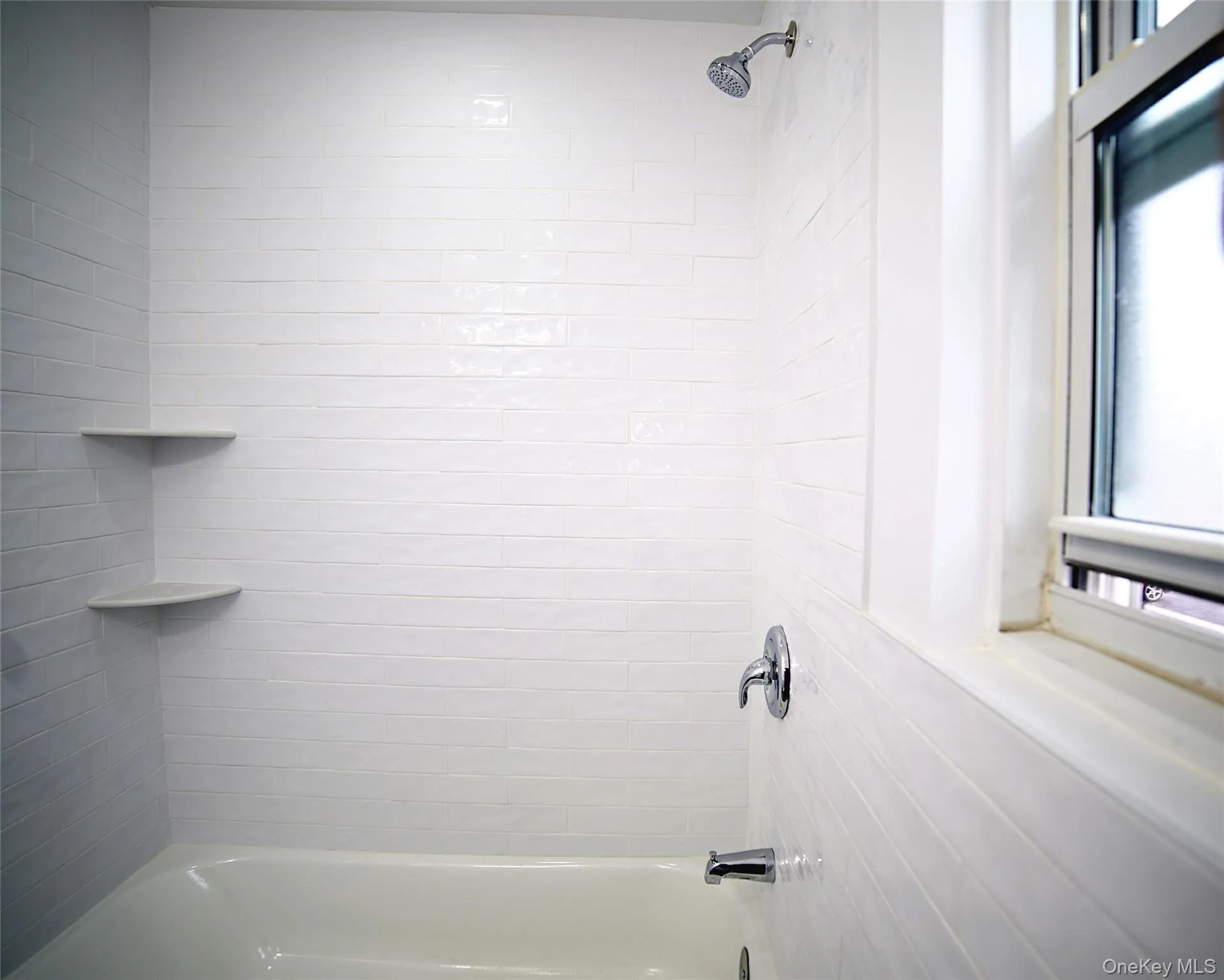 Full bathroom featuring shower combination Full bathroom featuring shower combination