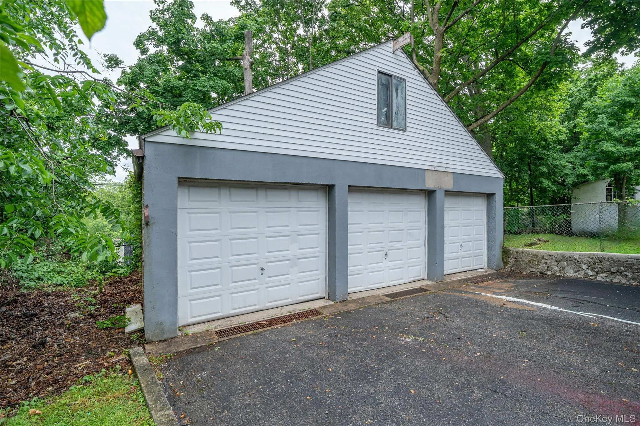 Three Car Garage w/ Walk Up Loft Storage Three Car Garage w/ Walk Up Loft Storage