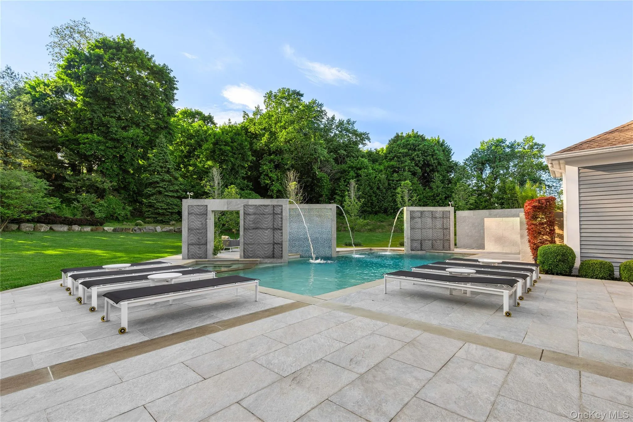 The pool sculptures are complete with custom lighting and fountains The pool sculptures are complete with custom lighting and fountains
