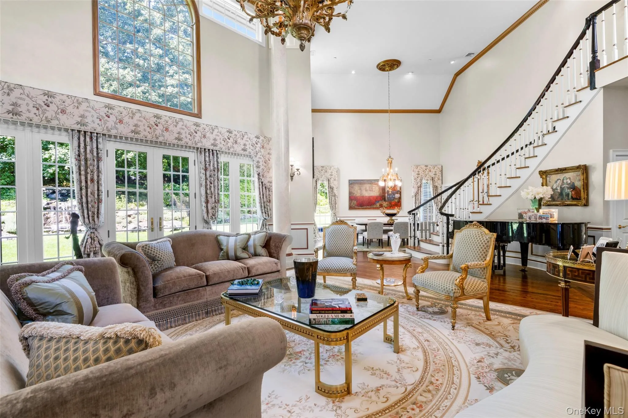 Dramatic 21 ft ceilings in the living and dining rooms Dramatic 21 ft ceilings in the living and dining rooms