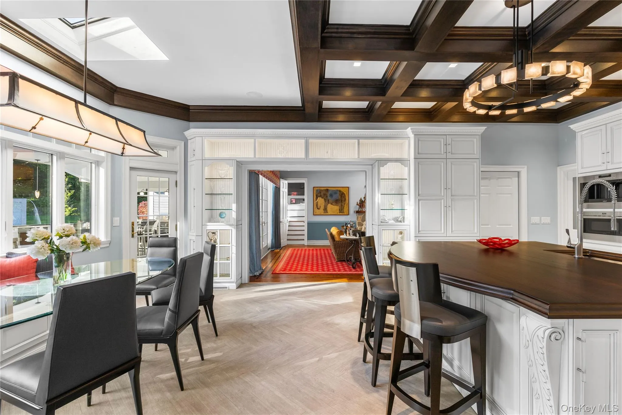 Located at the center of the home, the kitchen flows beautifully to the family rooms, dining room and outdoors Located at the center of the home, the kitchen flows beautifully to the family rooms, dining room and outdoors