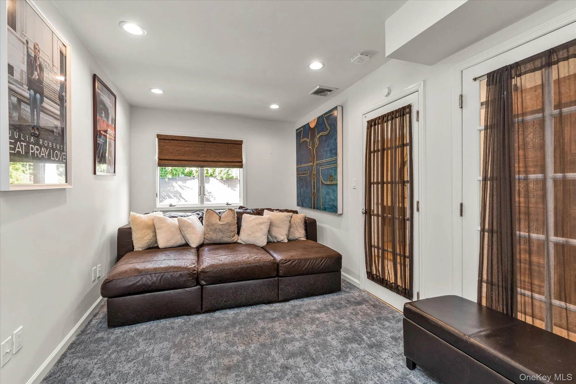 Living room featuring carpet and recessed lighting Living room featuring carpet and recessed lighting