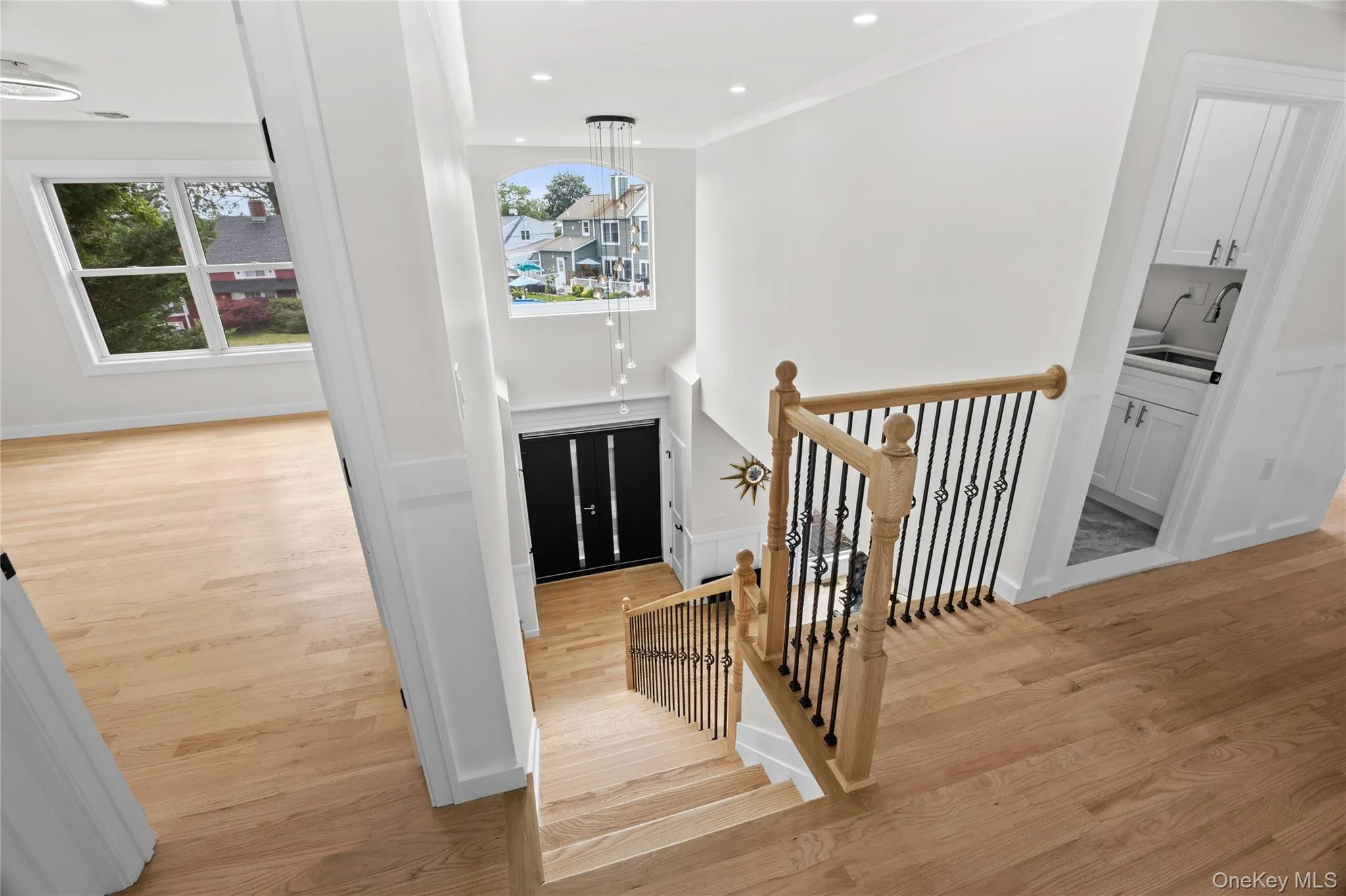 Grand Entry with 2 coat closets, custom woodwork front door header, chandelier lowering mechanism for easy cleaning! Grand Entry with 2 coat closets, custom woodwork front door header, chandelier lowering mechanism for easy cleaning!