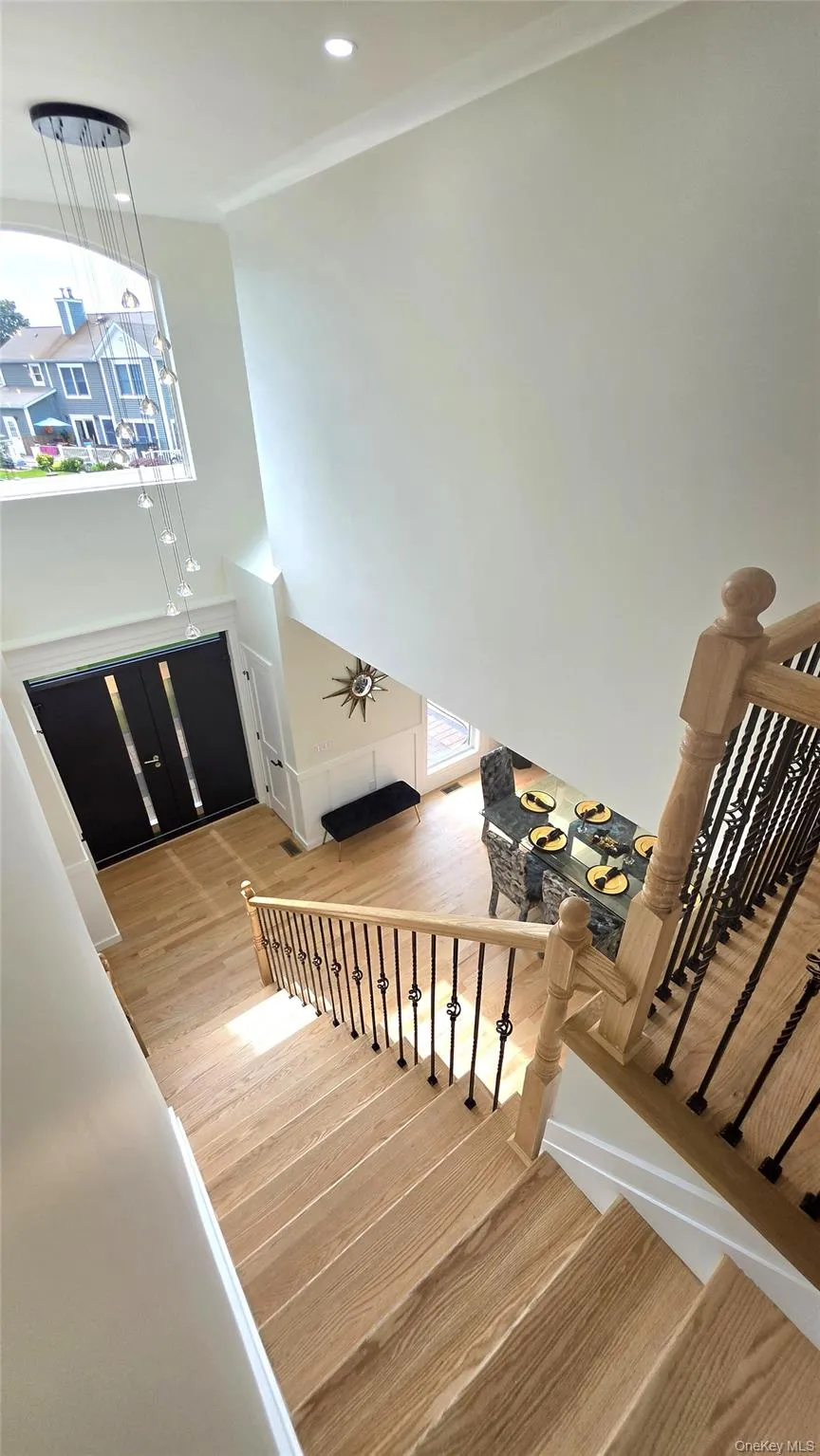 Grand Entryway with 2 closets and motorized chandelier lift. Grand Entryway with 2 closets and motorized chandelier lift.