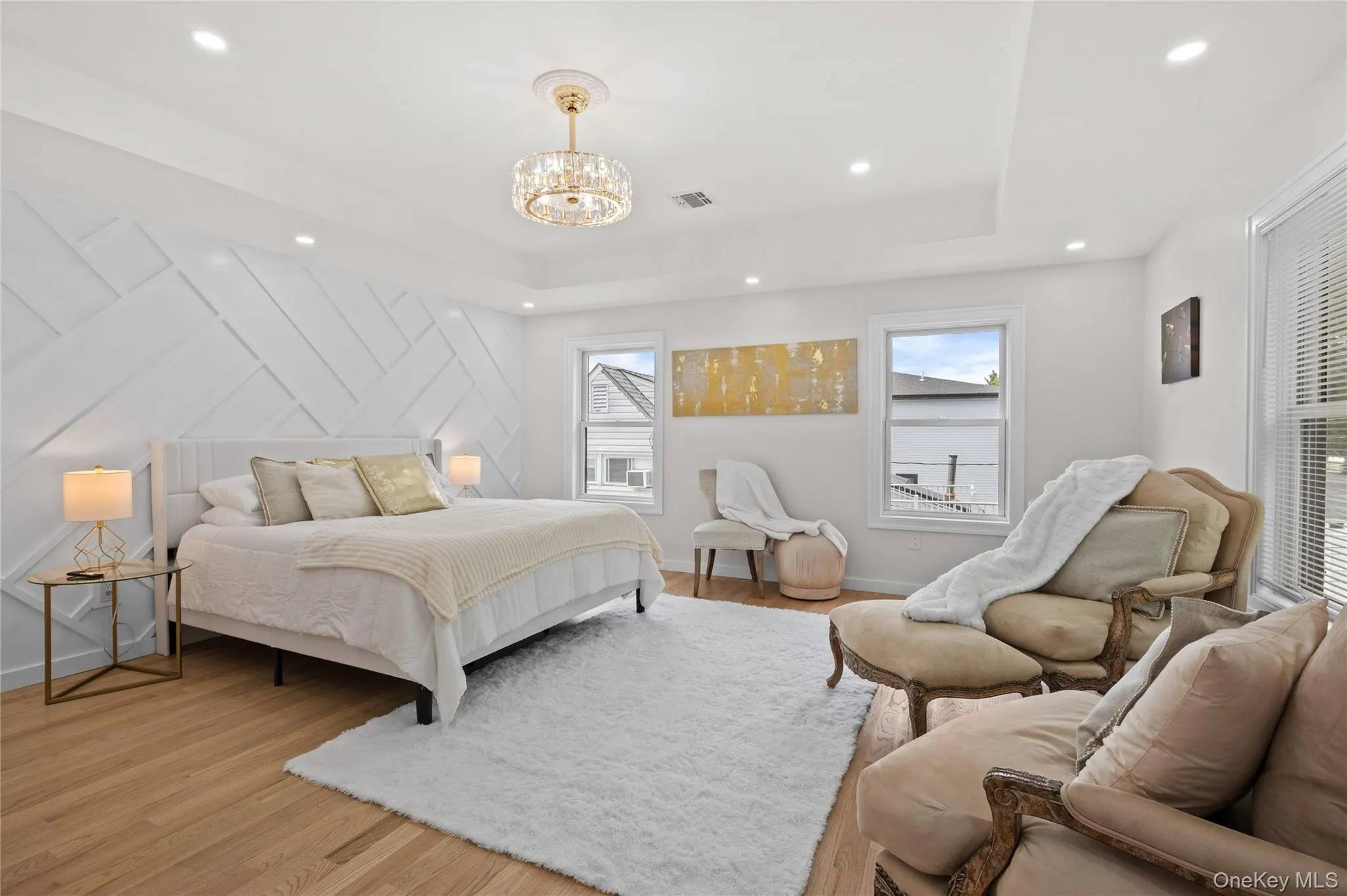 Beautiful Primary Bedroom with tray ceiling, wainscoting wall with SPA STYLE Full bath and WIC Beautiful Primary Bedroom with tray ceiling, wainscoting wall with SPA STYLE Full bath and WIC