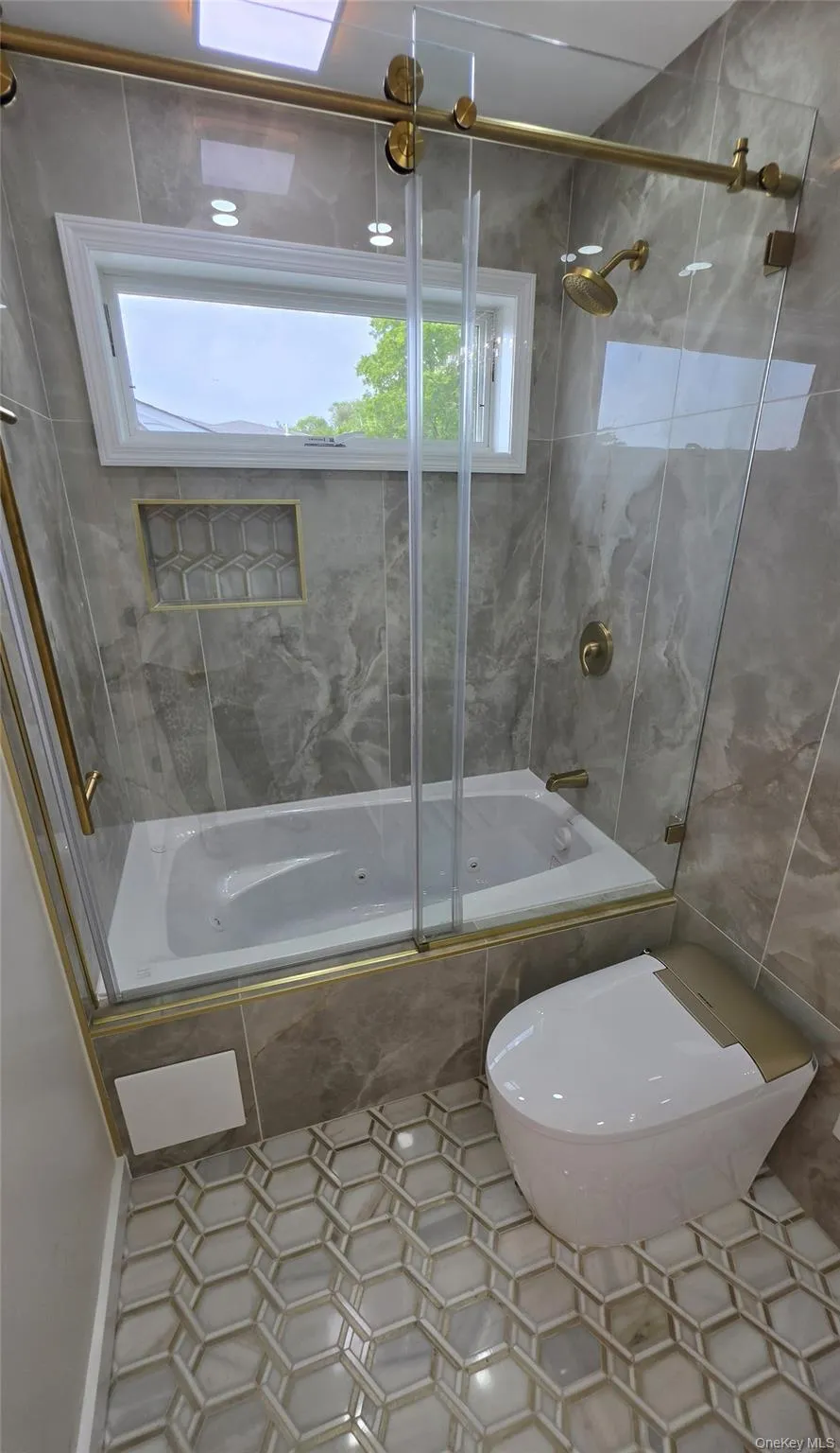 @nd floor bedroom Full bath with jacuzzi and marble tile @nd floor bedroom Full bath with jacuzzi and marble tile