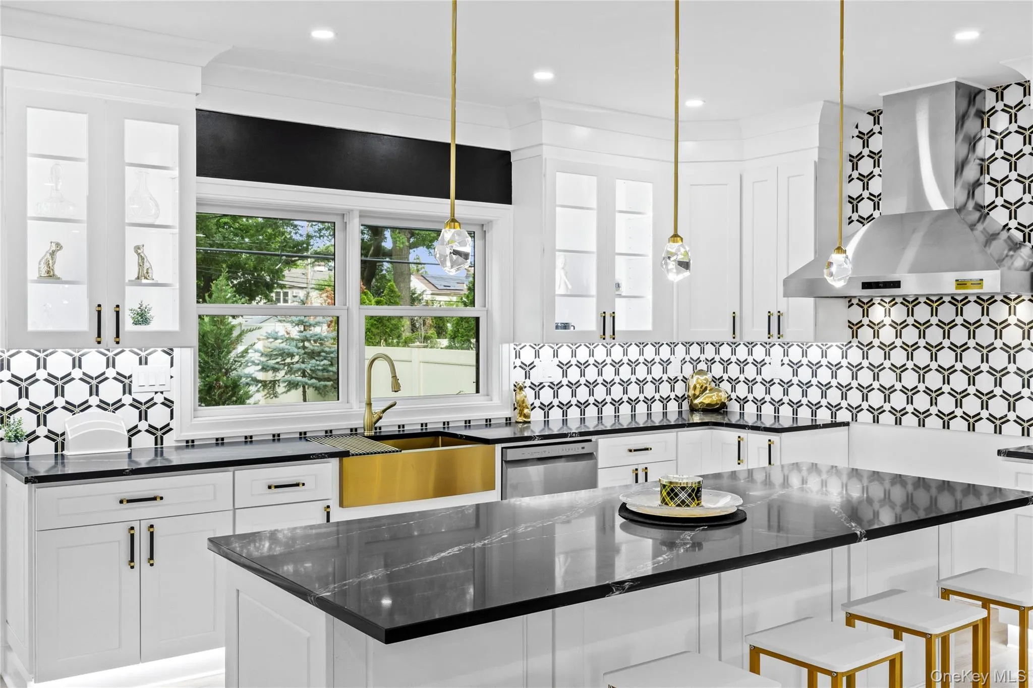 CUSTOM ORIGINAL DESIGN with marble backsplash and gold accents CUSTOM ORIGINAL DESIGN with marble backsplash and gold accents
