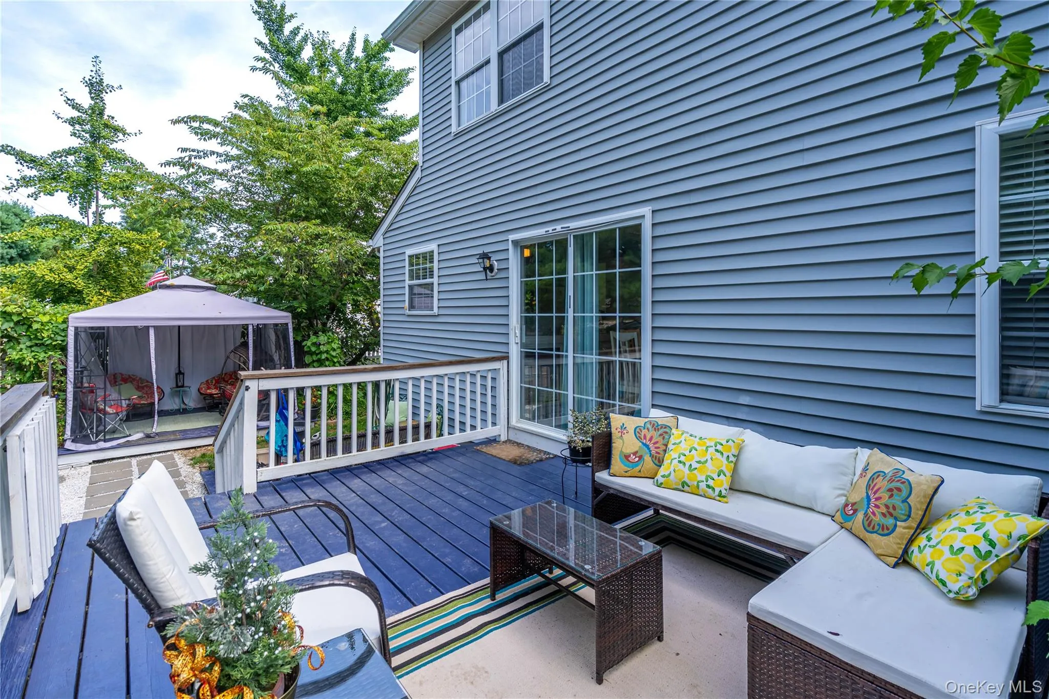 Deck featuring a gazebo and outdoor lounge area Deck featuring a gazebo and outdoor lounge area