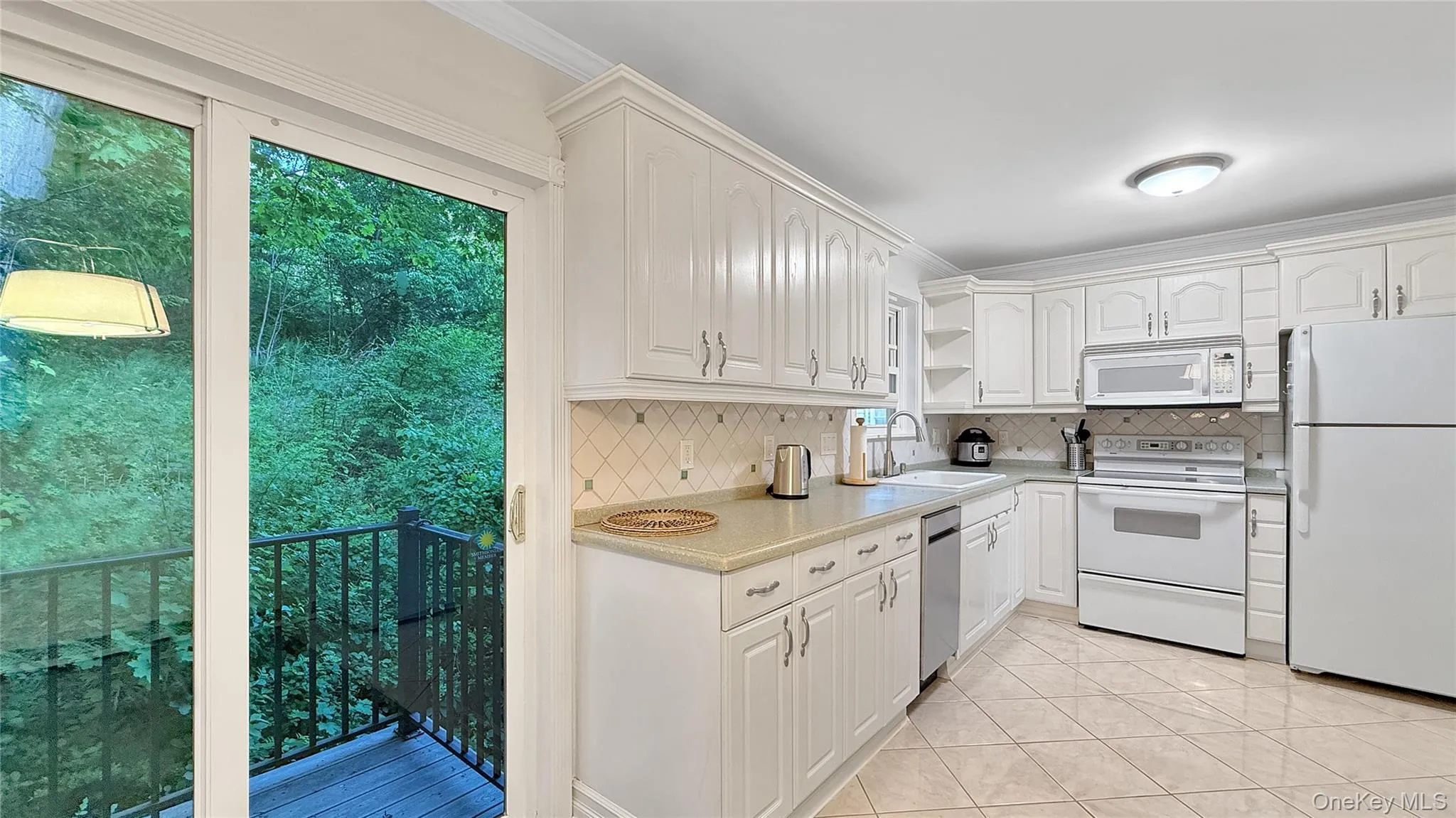 Kitchen with sliders to balcony Kitchen with sliders to balcony
