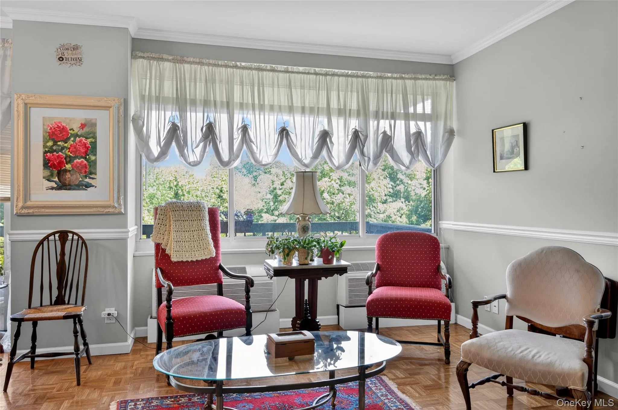 Expansive window featuring exterior greenery Expansive window featuring exterior greenery