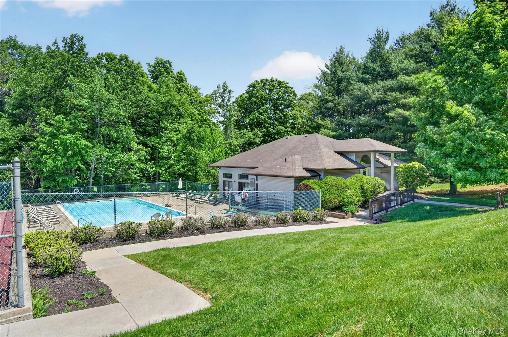 Community Pool And Clubhouse. Community Pool And Clubhouse.