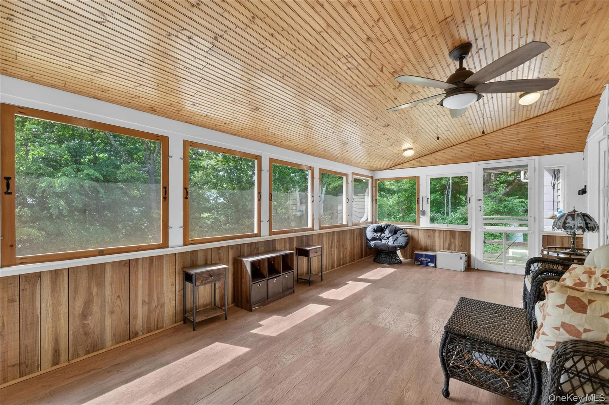 Sunroom with screens and removable windows. Sunroom with screens and removable windows.